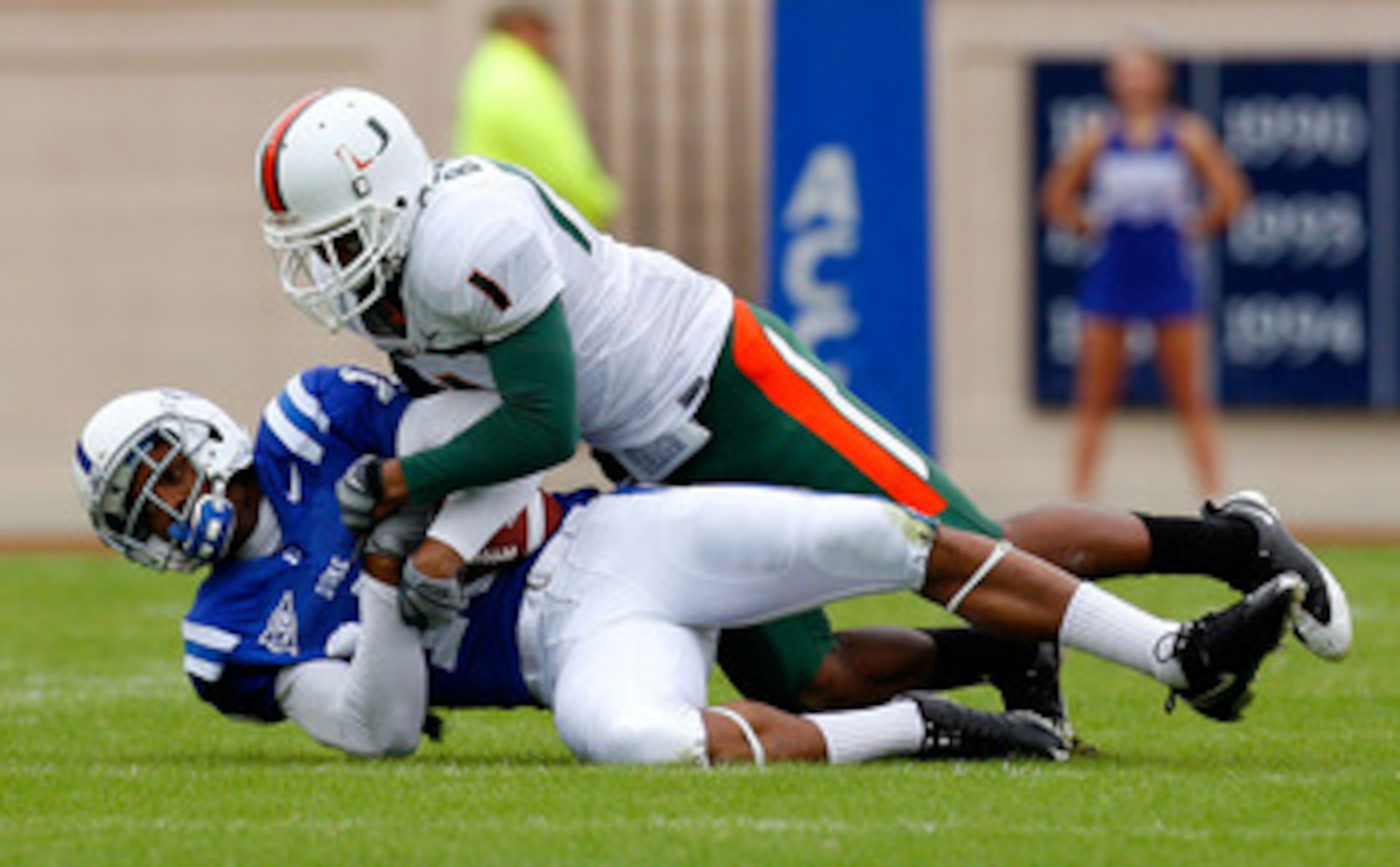 DURHAM, NC - OCTOBER 18:  Receiver Eron Riley #15 of the Duke Blue Devils pulls in this reception against Brandon Harris #1 of the Miami Hurricanes during the game at Wallace Wade Stadium on October 18, 2008 in Durham, North Carolina.  (Photo by Kevin C.