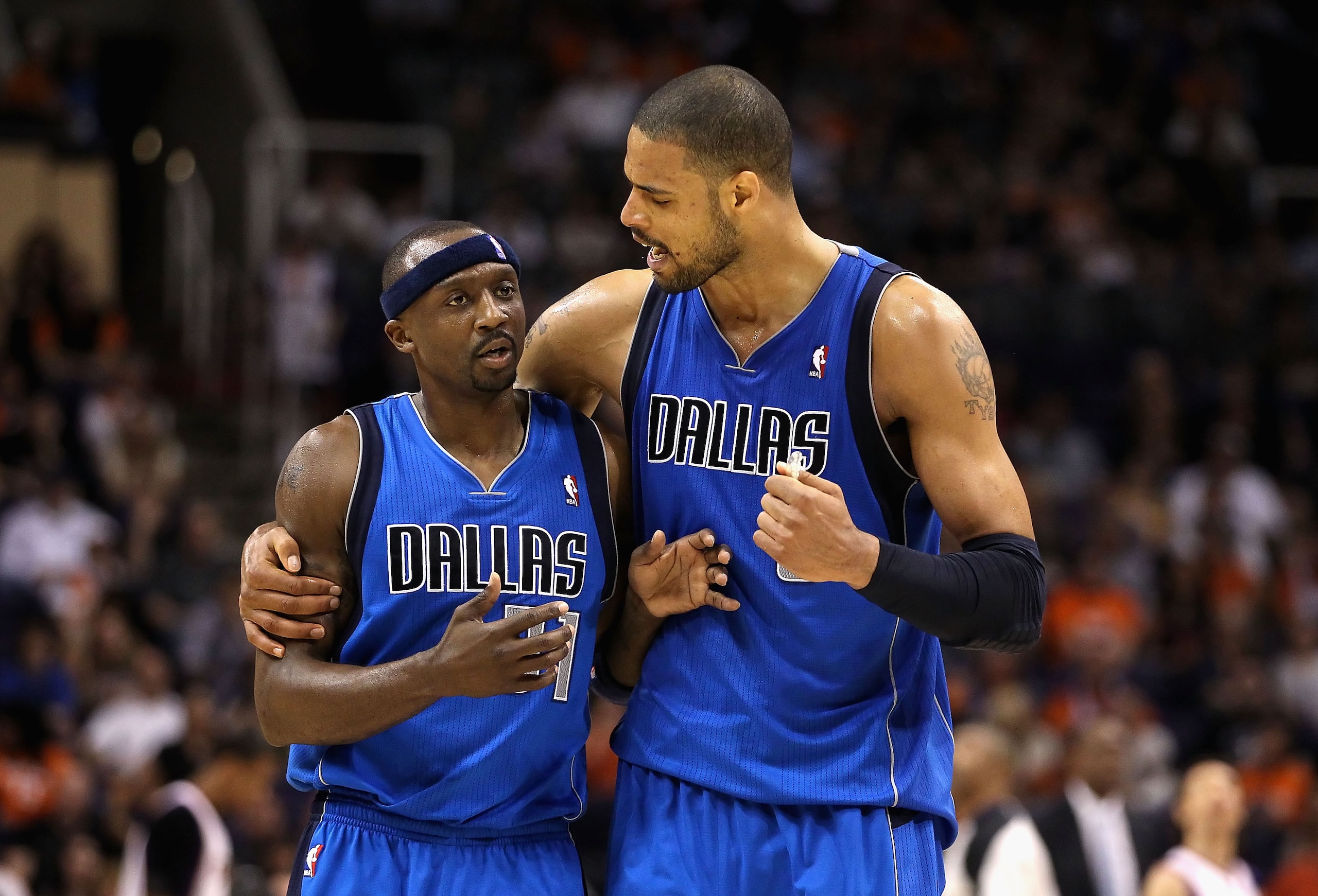 PHOENIX, AZ - MARCH 27:  Jason Terry #31 and Tyson Chandler #6 of the Dallas Mavericks react after scoring against the Phoenix Suns during the NBA game at US Airways Center on March 27, 2011 in Phoenix, Arizona. The Mavericks defeated the Suns 91-83. NOTE