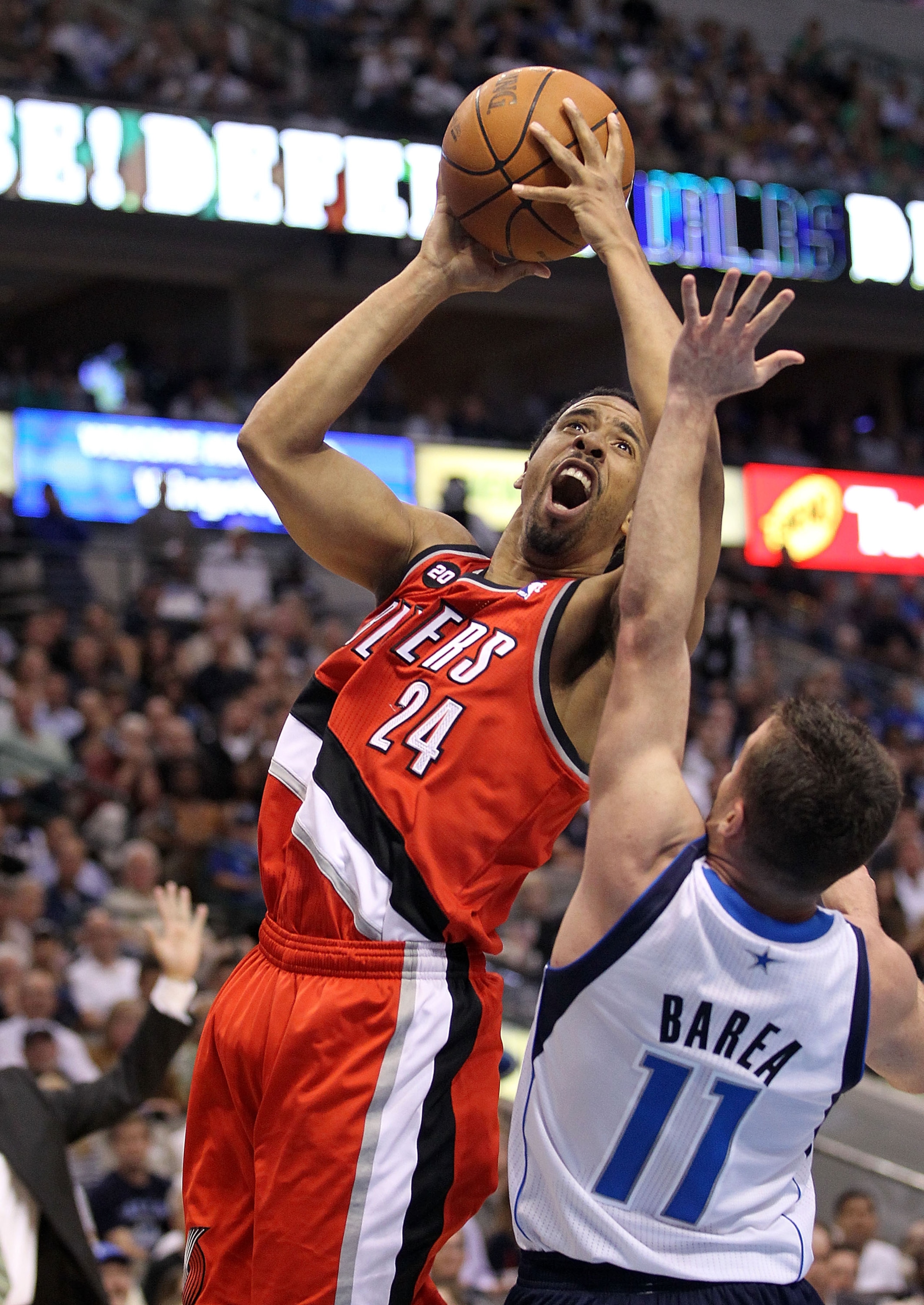 DALLAS, TX - APRIL 19:  Guard Andre Miller #24 of the Portland Trail Blazers takes a shot against Jose Juan Barea #11 of the Dallas Mavericks in Game Two of the Western Conference Quarterfinals during the 2011 NBA Playoffs on April 19, 2011 at American Ai