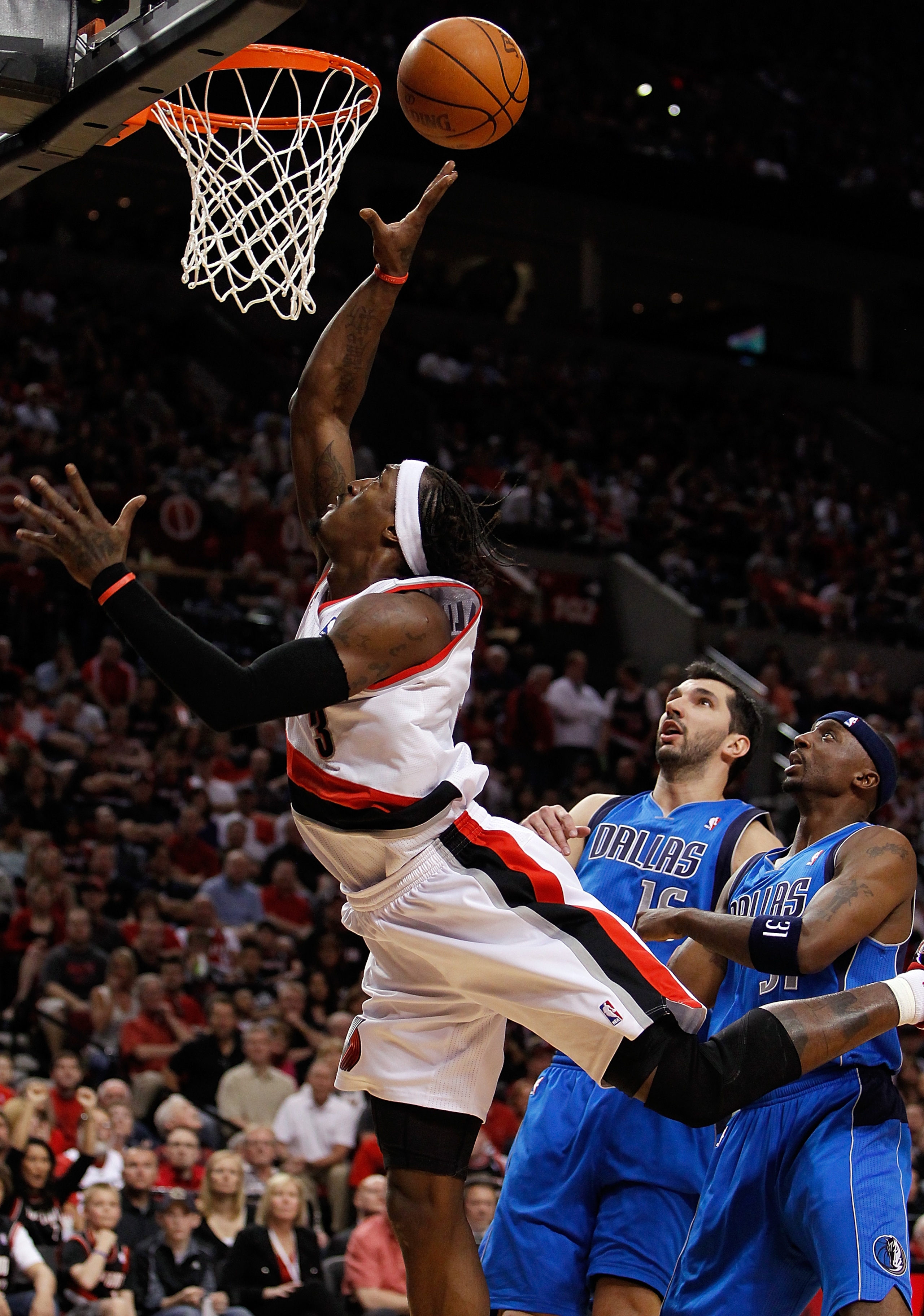 PORTLAND, OR - APRIL 23:  Gerald Wallace #3 of the Portland Trail Blazers lays up the ball against the Dallas Mavericks in Game Four of the Western Conference Quarterfinals in the 2011 NBA Playoffs on April 23, 2011 at the Rose Garden in Portland, Oregon.
