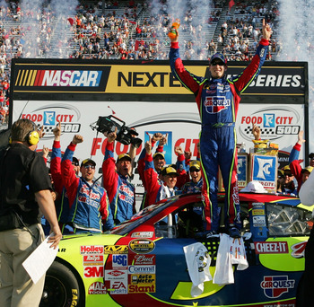 BRISTOL, TN - MARCH 25:  Kyle Busch, driver of the #5 Carquest/Kellogg's Chevrolet, celebrates in victory lane after winning the NASCAR Nextel Cup Series Food City 500 at Bristol Motor Speedway on March 25, 2007 in Bristol, Tennessee. Busch became the fir
