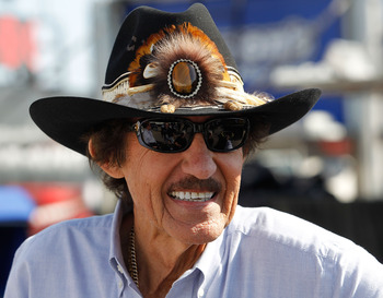 DAYTONA BEACH, FL - FEBRUARY 18:  Hall of fame driver Richard Petty looks on in the garage area during practice for the NASCAR Sprint Cup Series Daytona 500 at Daytona International Speedway on February 18, 2011 in Daytona Beach, Florida.  (Photo by Tom P