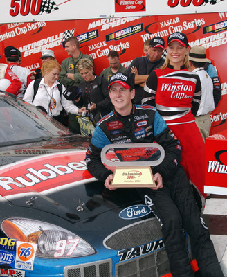 MARTINSVILLE, VA - OCTOBER 20:  Kurt Busch, driver of the #97 Sharpie Ford Taurus, celebrates after winning the NASCAR Winston Cup Old Dominion 500 on October 20, 2002 at Martinsville Speedway in Martinsville, Virginia. (Photo By Rusty Jarrett/Getty Image