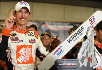 LOUDON, NH - JUNE 28:  Joey Logano, driver of the #20 Home Depot Toyota, celebrates winning the NASCAR Sprint Cup Series LENOX Industrial Tools 301 at New Hampshire Motor Speedway on June 28, 2009 in Loudon, New Hampshire. Logano won the rain shortened ra