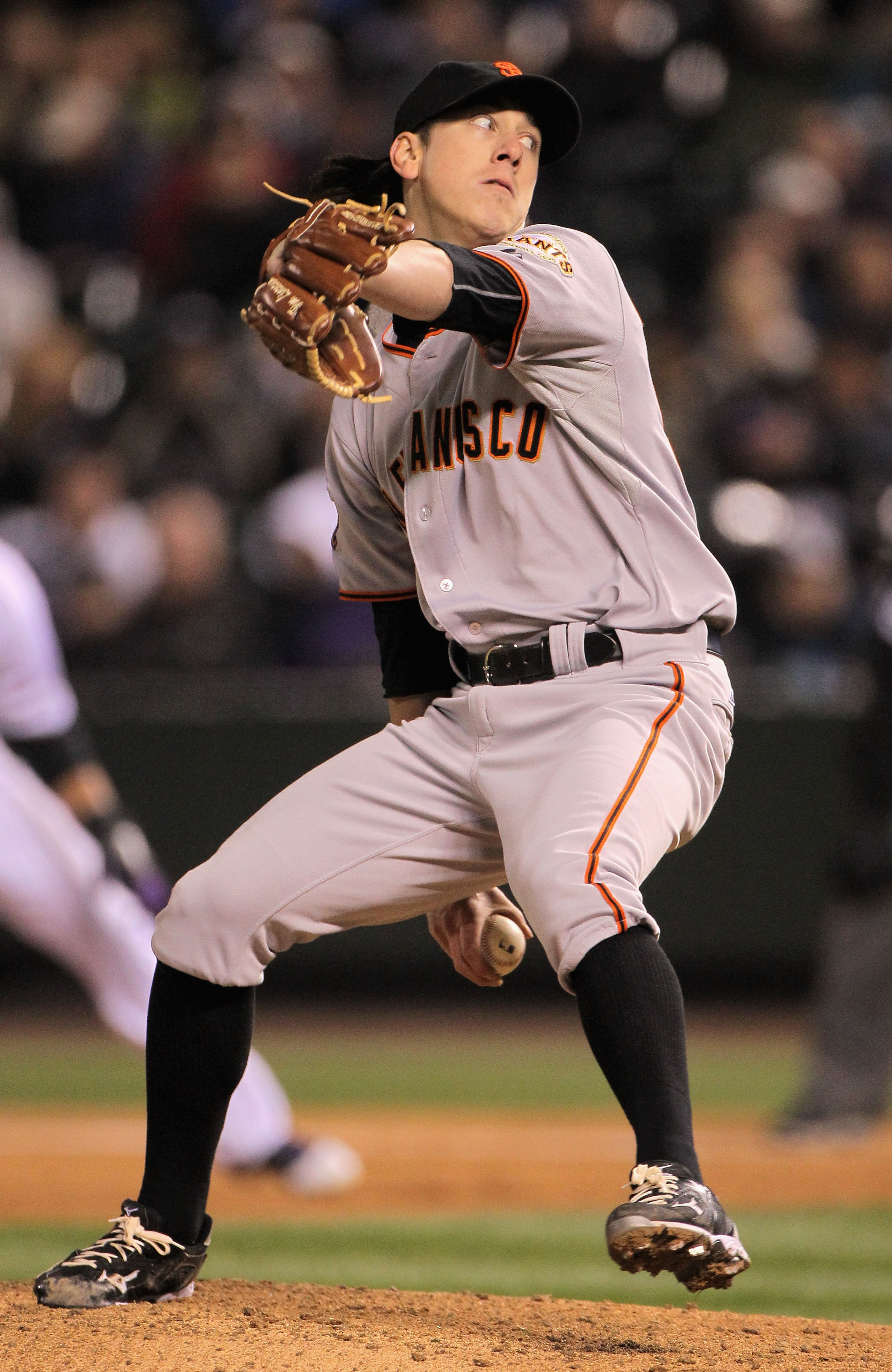 DENVER, CO - APRIL 18: Starting pitcher Tim Lincecum #55 of the San Francisco Giants delivers against the Colorado Rockies at Coors Field on April 18, 2011 in Denver, Colorado. Lincecum recorded 10 strike outs as he earned the win as the Giants defeated DENVER, CO - APRIL 18: Starting pitcher Tim Lincecum #55 of the San Francisco Giants delivers against the Colorado Rockies at Coors Field on April 18, 2011 in Denver, Colorado. Lincecum recorded 10 strike outs as he earned the win as the Giants defeated