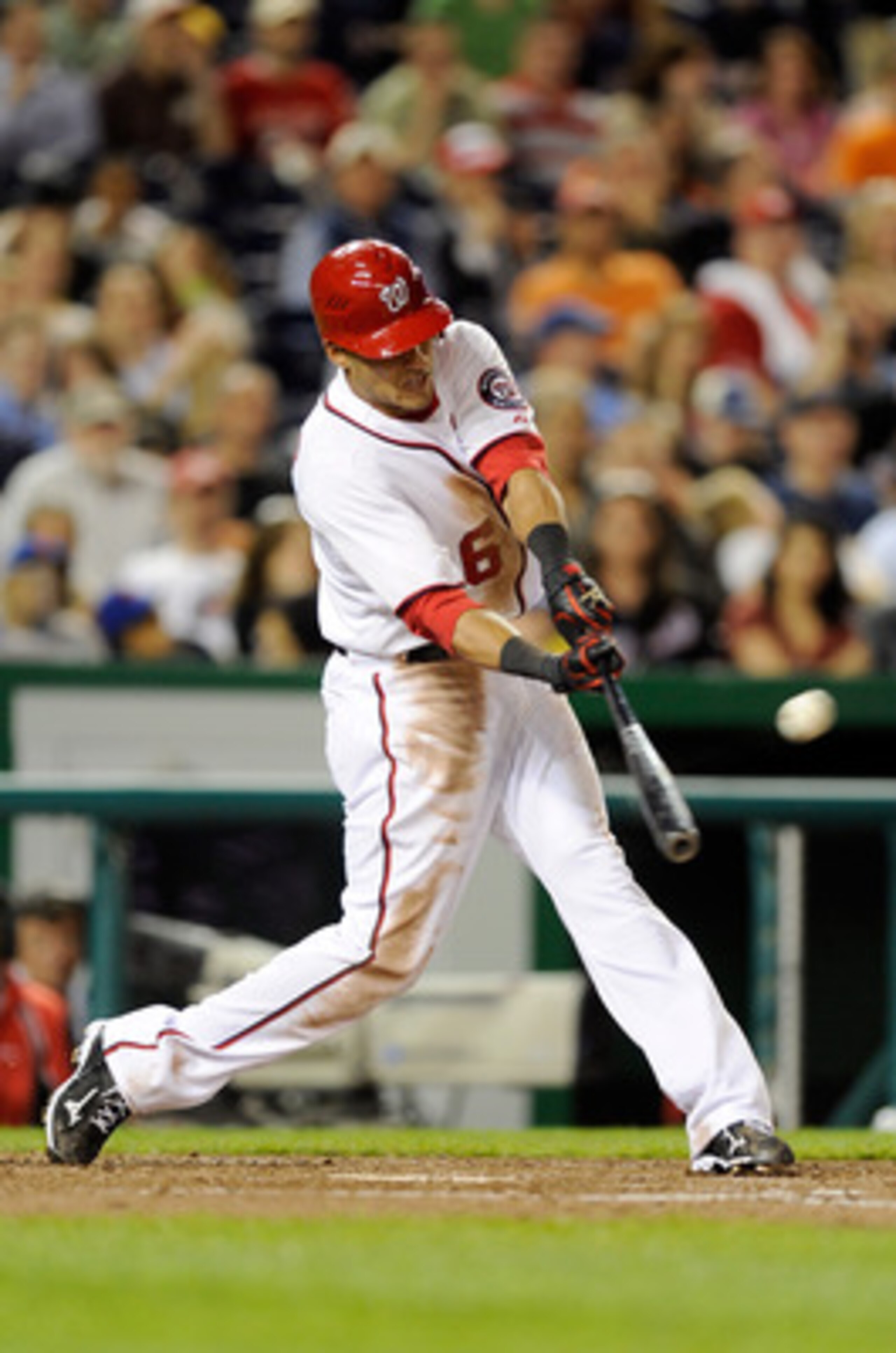 WASHINGTON, DC - APRIL 28:  Ian Desmond #6 of the Washington Nationals hits a home run in the fifth inning against the New York Mets at Nationals Park on April 28, 2011 in Washington, DC.  (Photo by Greg Fiume/Getty Images)