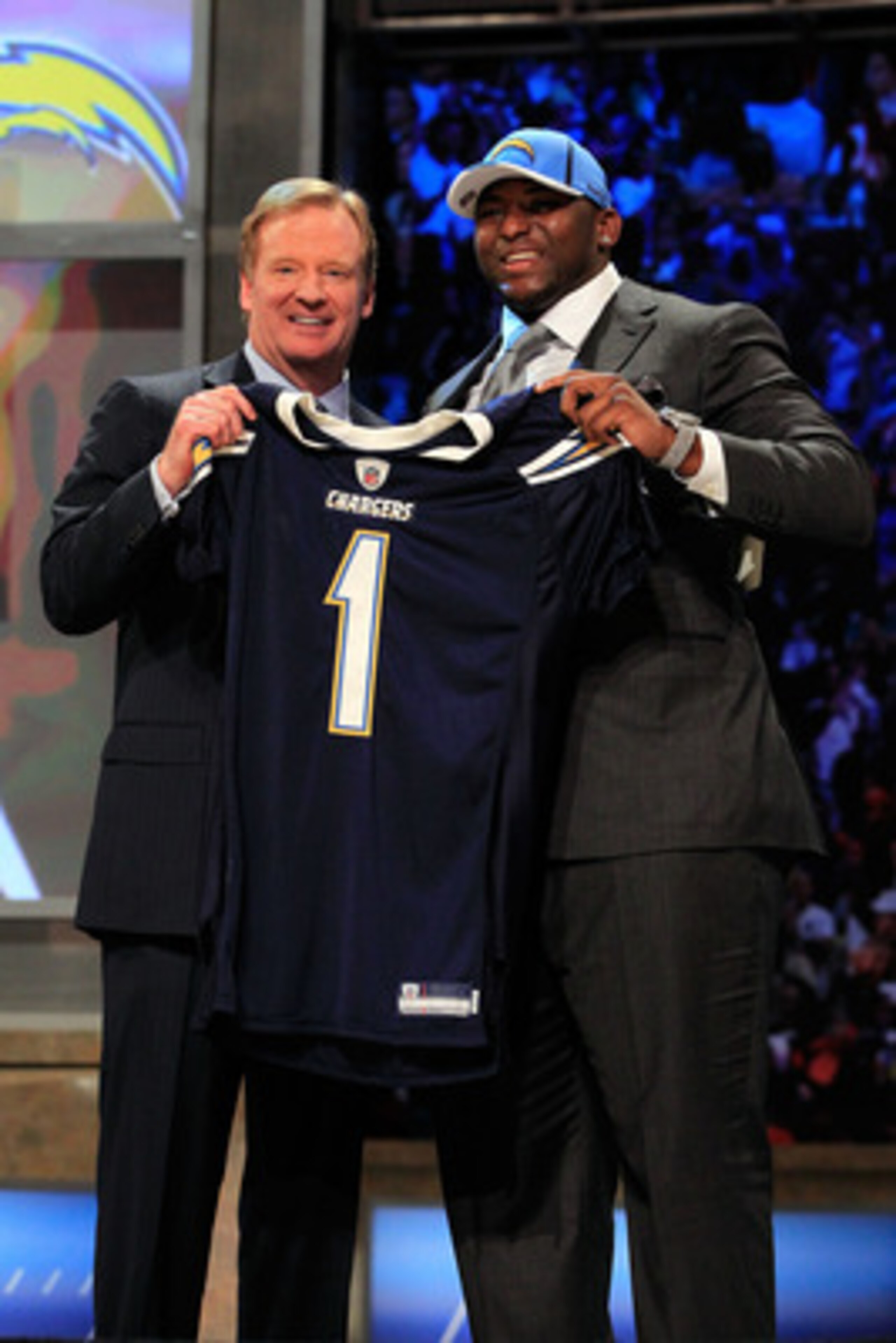 NEW YORK, NY - APRIL 28:  NFL Commissioner Roger Goodell (L) poses for a photo with Corey Liuget, #18 overall pick by the San Diego Chargers, on stage during the 2011 NFL Draft at Radio City Music Hall on April 28, 2011 in New York City.  (Photo by Chris 