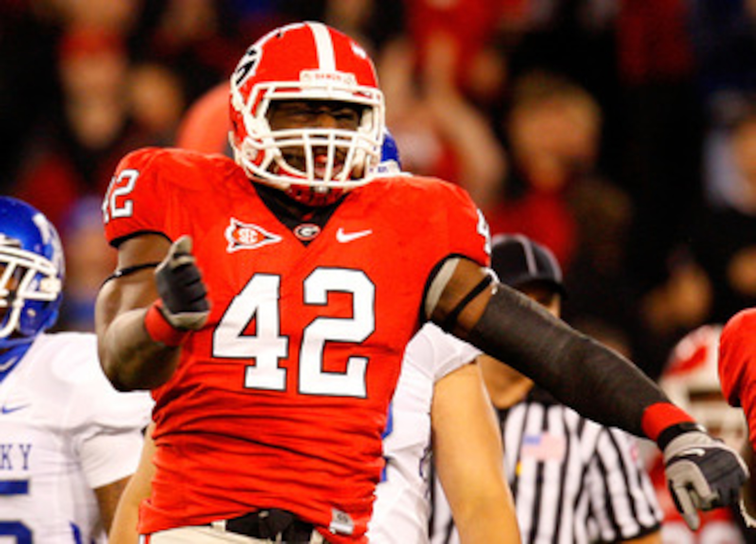 ATHENS, GA - NOVEMBER 21:  Justin Houston #42 of the Georgia Bulldogs celebrates a sack against the Kentucky Wildcats at Sanford Stadium on November 21, 2009 in Athens, Georgia.  (Photo by Kevin C. Cox/Getty Images)
