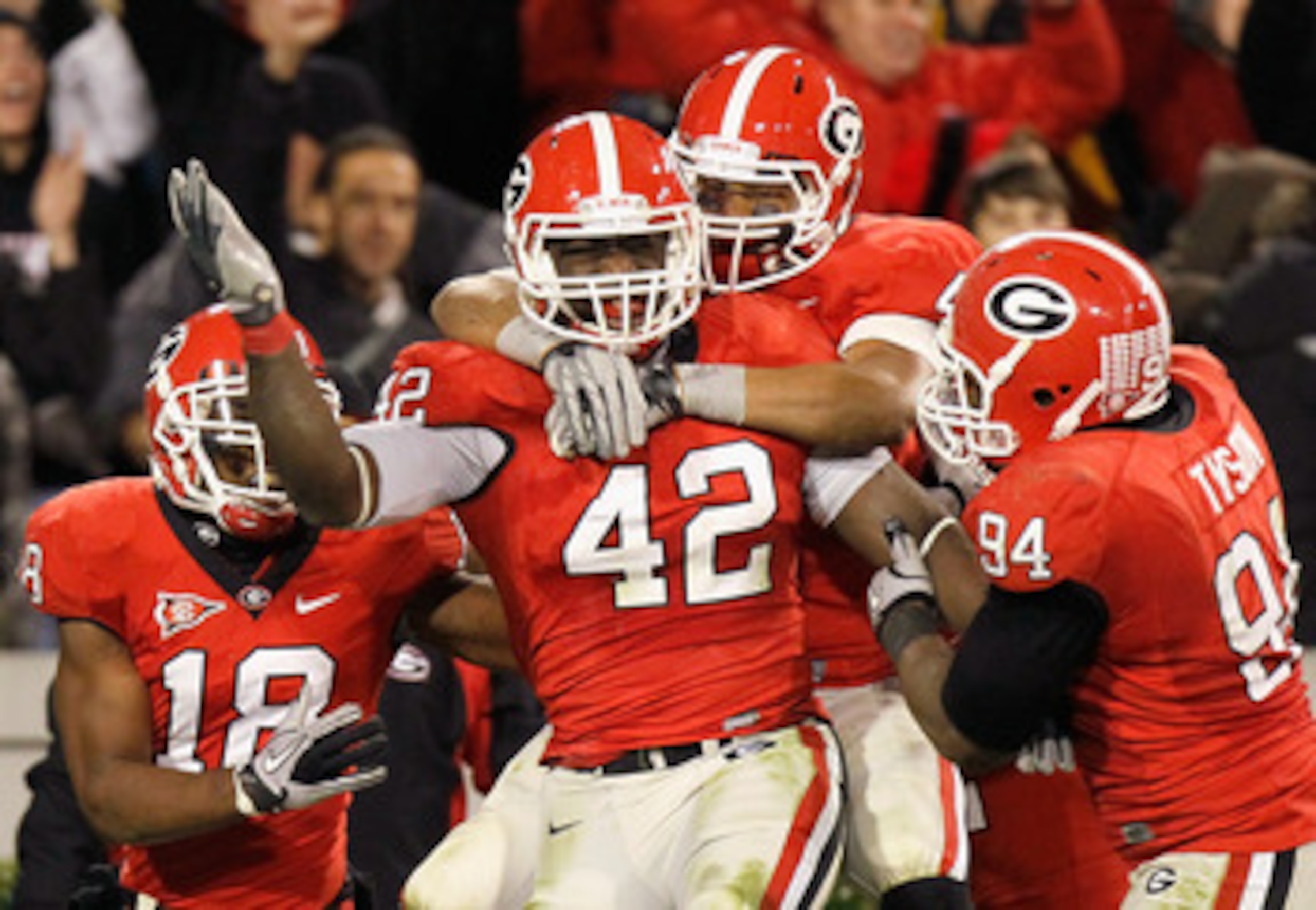ATHENS, GA - NOVEMBER 27: Justin Houston #42 of the Georgia Bulldogs celebrates after returning a fumble for a touchdown against the Georgia Tech Yellow Jackets at Sanford Stadium on November 27, 2010 in Athens, Georgia. (Photo by Kevin C. Cox/Getty Ima ATHENS, GA - NOVEMBER 27: Justin Houston #42 of the Georgia Bulldogs celebrates after returning a fumble for a touchdown against the Georgia Tech Yellow Jackets at Sanford Stadium on November 27, 2010 in Athens, Georgia. (Photo by Kevin C. Cox/Getty Ima
