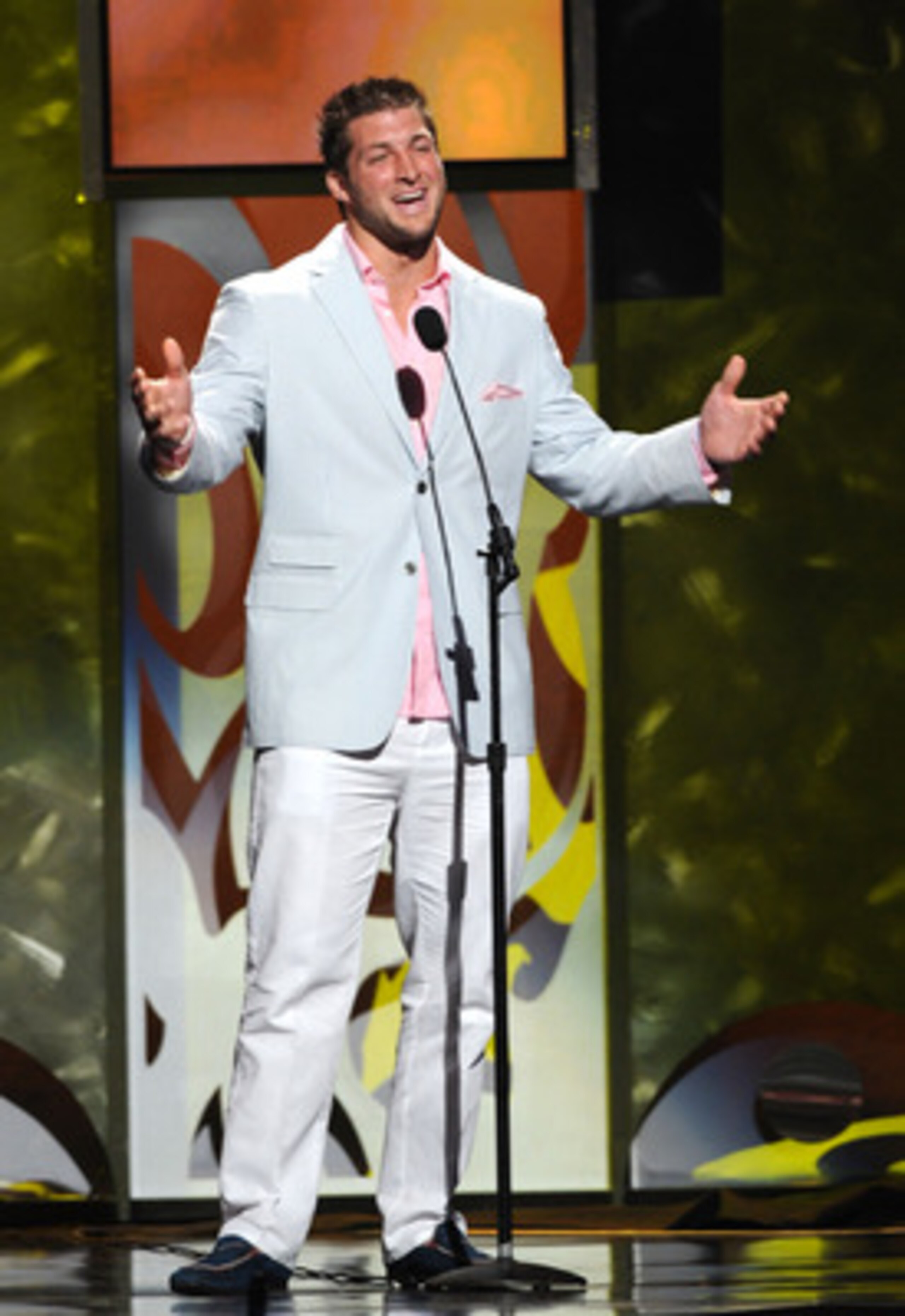 ATLANTA, GA - APRIL 20:  NFL player Tim Tebow speaks onstage at the 42nd Annual GMA Dove Awards at The Fox Theatre on April 20, 2011 in Atlanta City. The show airs on GMC on Sunday April 24th 2011.  (Photo by Rick Diamond/Getty Images for GMA)