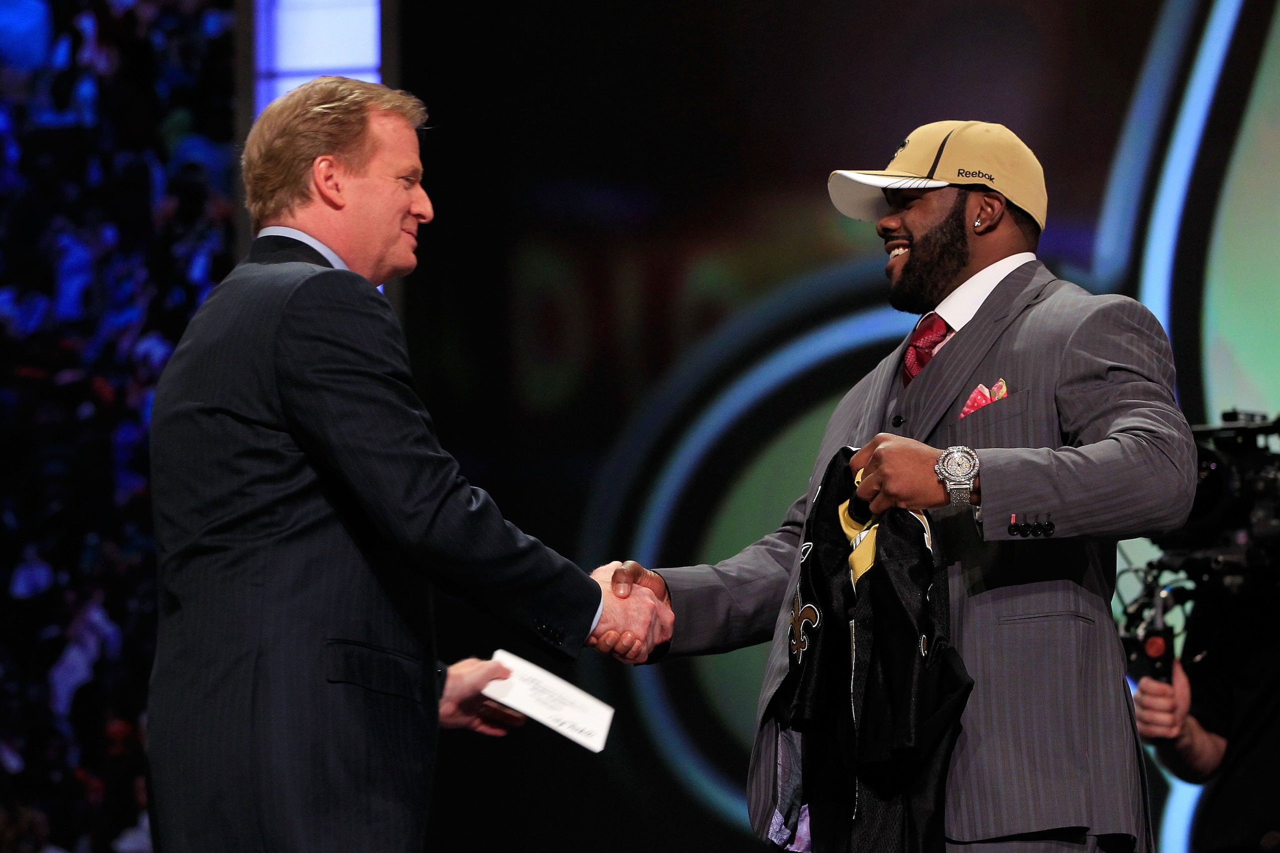NEW YORK, NY - APRIL 28:  NFL Commissioner Roger Goodell (L) greets Mark Ingram, #28 overall pick by the New Orleans Saints, on stage during the 2011 NFL Draft at Radio City Music Hall on April 28, 2011 in New York City.  (Photo by Chris Trotman/Getty Ima