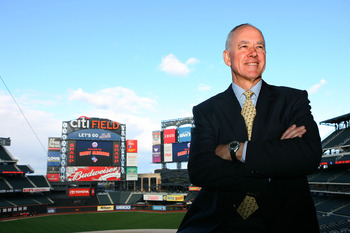NEW YORK - OCTOBER 29:  Sandy Alderson poses for photographers after being introduced as the general manager for the New York Mets on October 29, 2010 at Citi Field in the Flushing neighborhood of the Queens borough of New York City.  (Photo by Andrew Bur