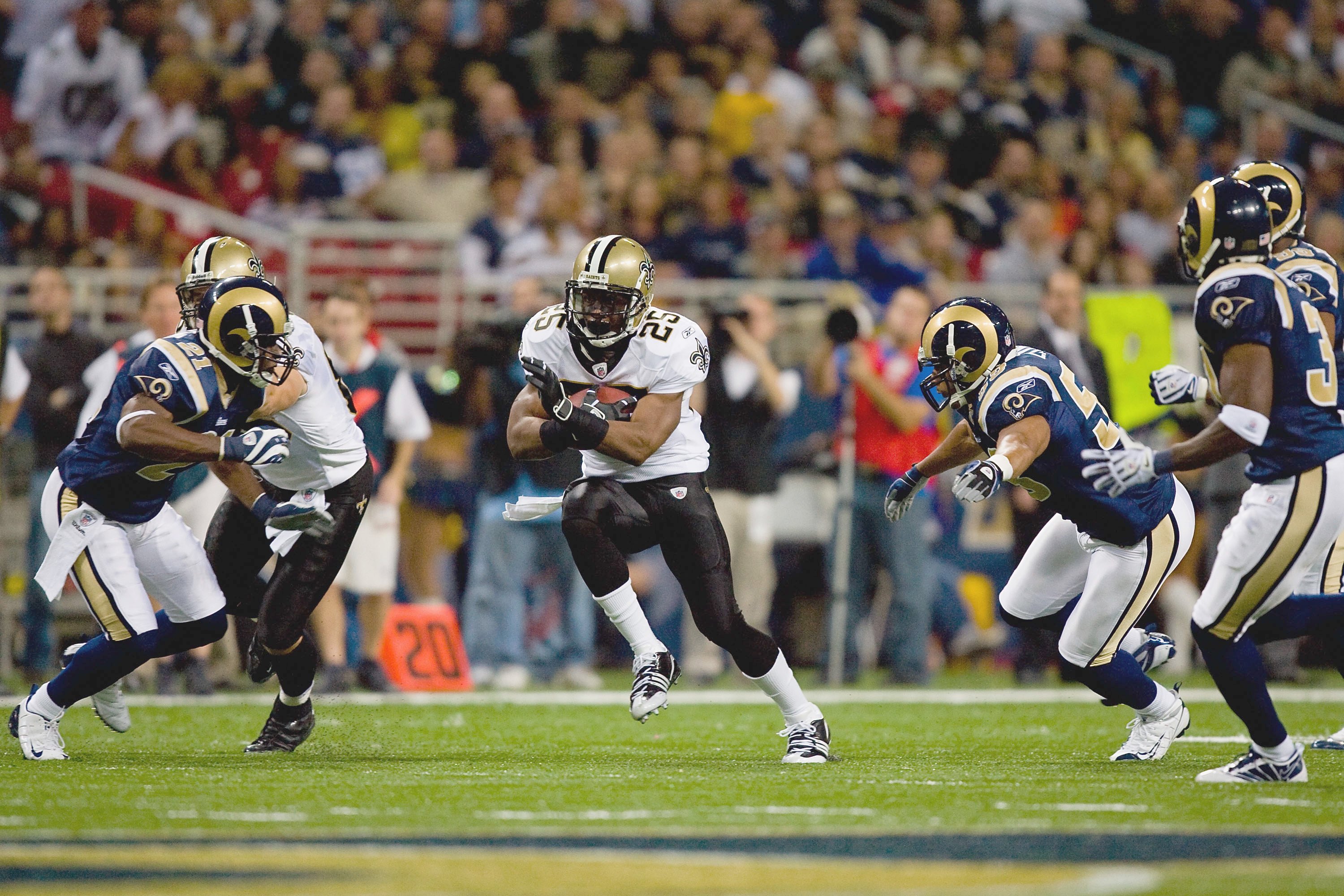 Reggie Bush of the New Orleans Saints carries the ball against the