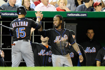 WASHINGTON, DC - APRIL 28:  Carlos Beltran #15 of the New York Mets is congratulated by Jose Reyes #7 after scoring in the sixth inning against the Washington Nationals at Nationals Park on April 28, 2011 in Washington, DC.  (Photo by Greg Fiume/Getty Ima