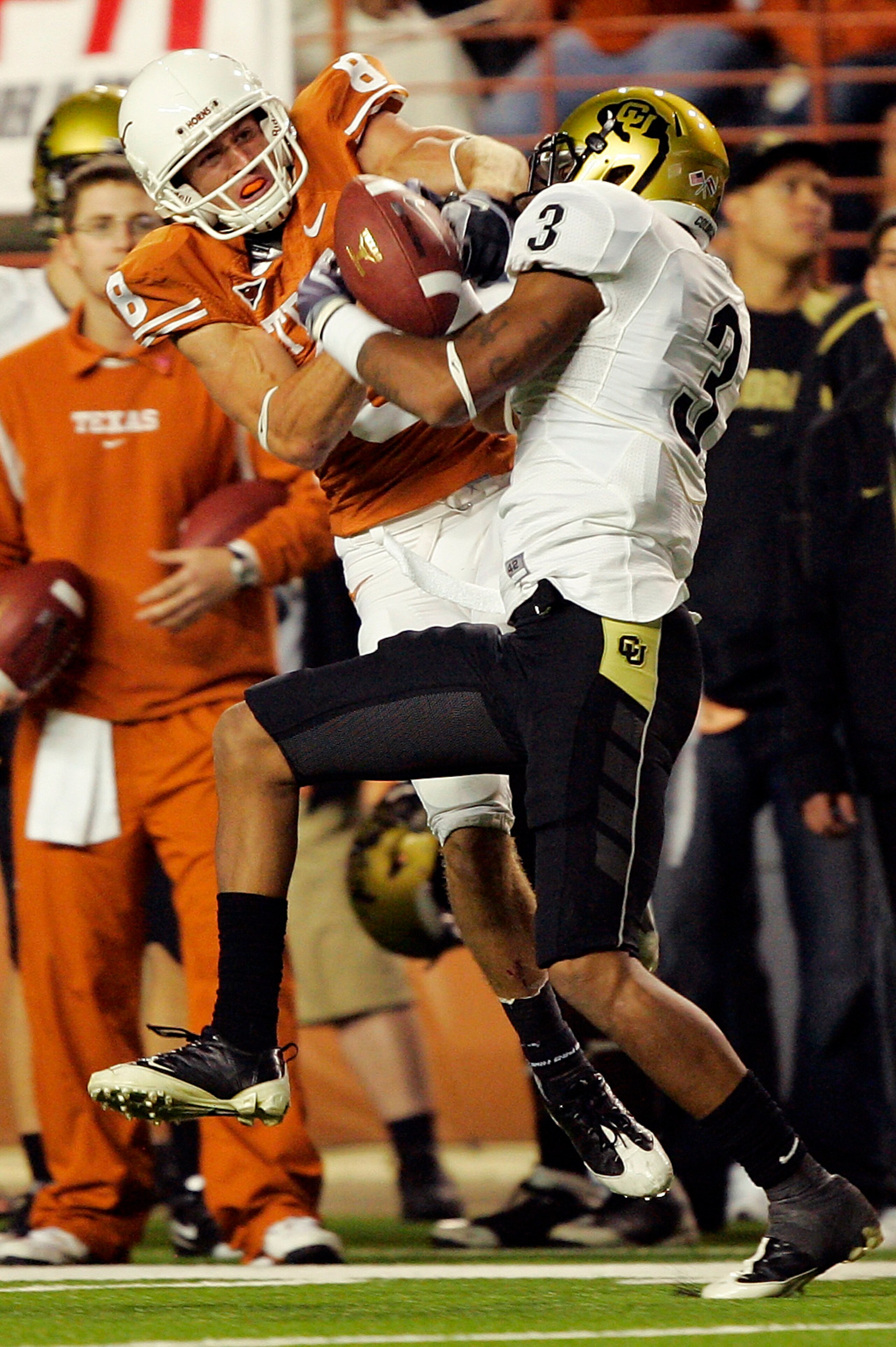 AUSTIN, TX - OCTOBER 10: Jordan Shipley #8 of the Texas Longhorns wrestles for control of the ball with cornerback Jimmy Smith #3 of the Colorado Buffaloes for an incomplete pass on October 10, 2009 at Darrell K Royal-Texas Memorial Stadium in Austin, Tex AUSTIN, TX - OCTOBER 10: Jordan Shipley #8 of the Texas Longhorns wrestles for control of the ball with cornerback Jimmy Smith #3 of the Colorado Buffaloes for an incomplete pass on October 10, 2009 at Darrell K Royal-Texas Memorial Stadium in Austin, Tex