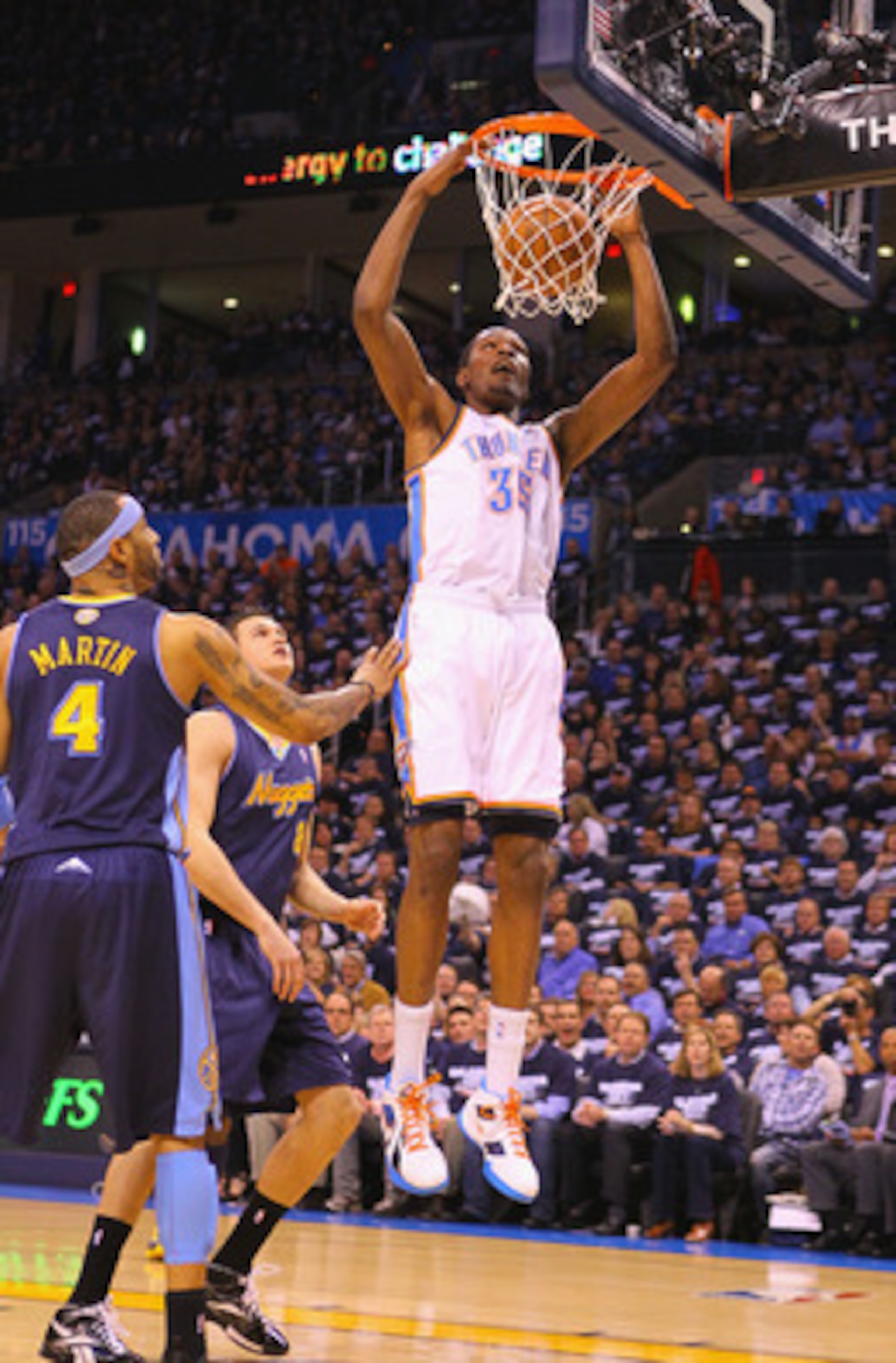 OKLAHOMA CITY, OK - APRIL 27: Kevin Durant #35 of the Oklahoma City Thunder dunks the ball against the Denver Nuggets in Game Five of the Western Conference Quarterfinals in the 2011 NBA Playoffs on April 27, 2011 at the Ford Center in Oklahoma City, Okla