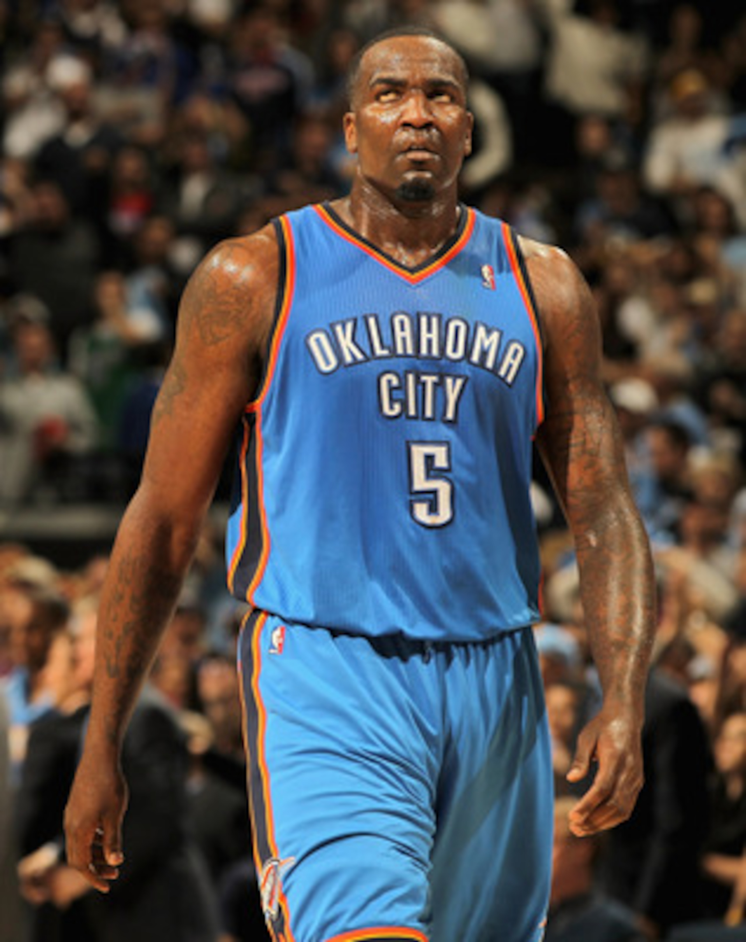 DENVER, CO - APRIL 25:  Kendrick Perkins #5 of the Oklahoma City Thunder walks upcourt against the Denver Nuggets late in the fourth quarter in Game Four of the Western Conference Quarterfinals in the 2011 NBA Playoffs on April 24, 2011 at the Pepsi Cente