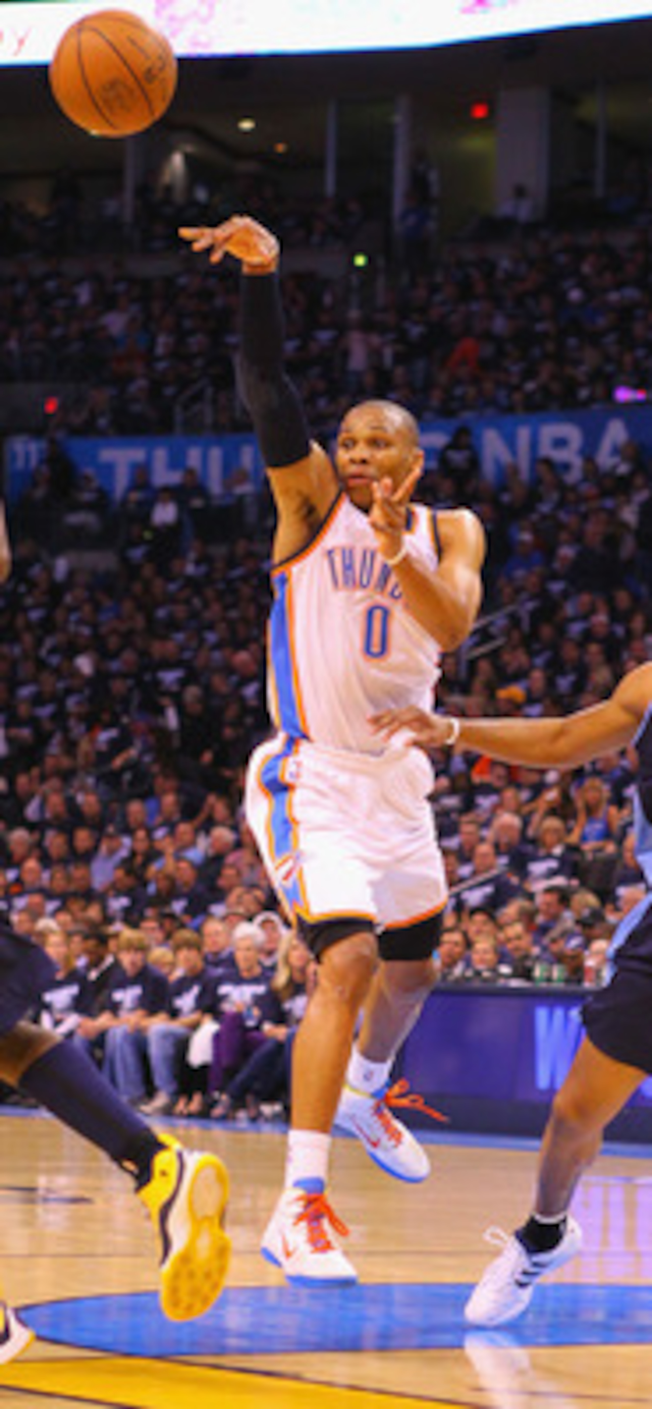 OKLAHOMA CITY, OK - APRIL 27: Russell Westbrook #0 of the Oklahoma City Thunder passes the ball against Arron Afflalo #6 of the Denver Nuggets in Game Five of the Western Conference Quarterfinals in the 2011 NBA Playoffs on April 27, 2011 at the Ford Cent
