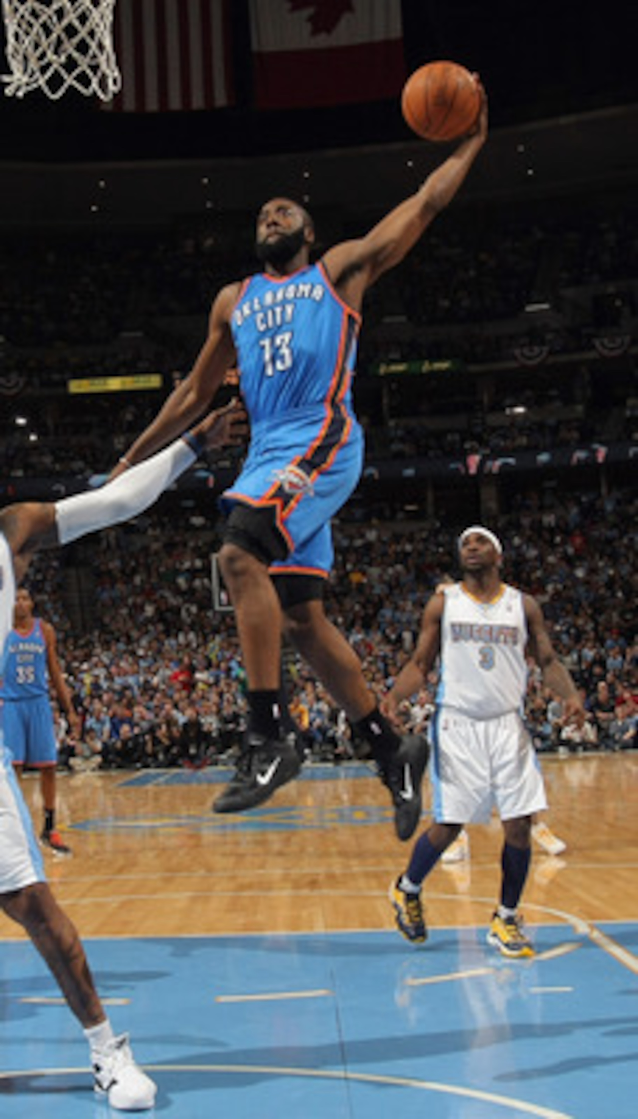 DENVER, CO - APRIL 25:  James Harden #13 of the Oklahoma City Thunder takes a shot over Al Harrington #7 of the Denver Nuggets in Game Four of the Western Conference Quarterfinals in the 2011 NBA Playoffs on April 24, 2011 at the Pepsi Center in Denver, C