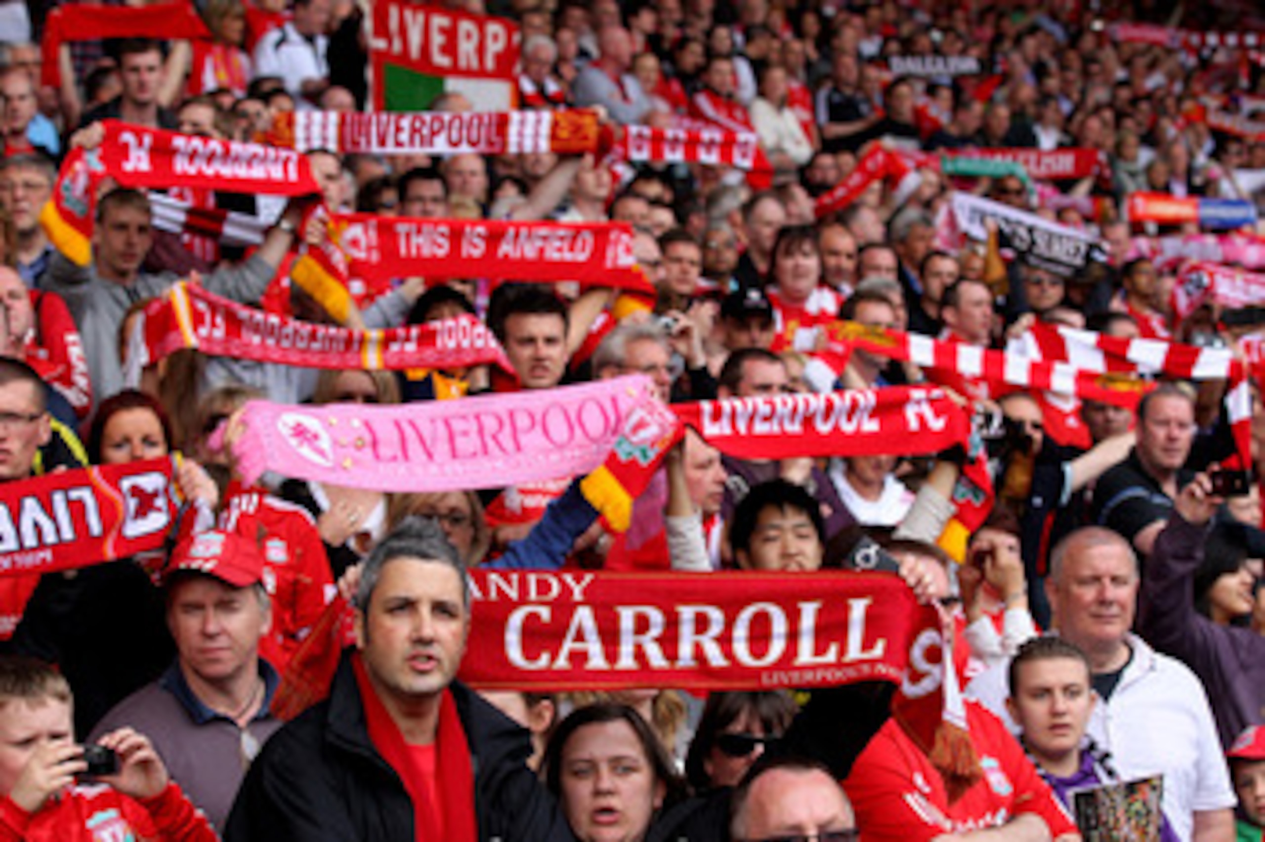 LIVERPOOL, ENGLAND - APRIL 23:  Liverpool fans show their support prior to the Barclays Premier League match between Liverpool and Birmingham City at Anfield on April 23, 2011 in Liverpool, England.  (Photo by Clive Brunskill/Getty Images)