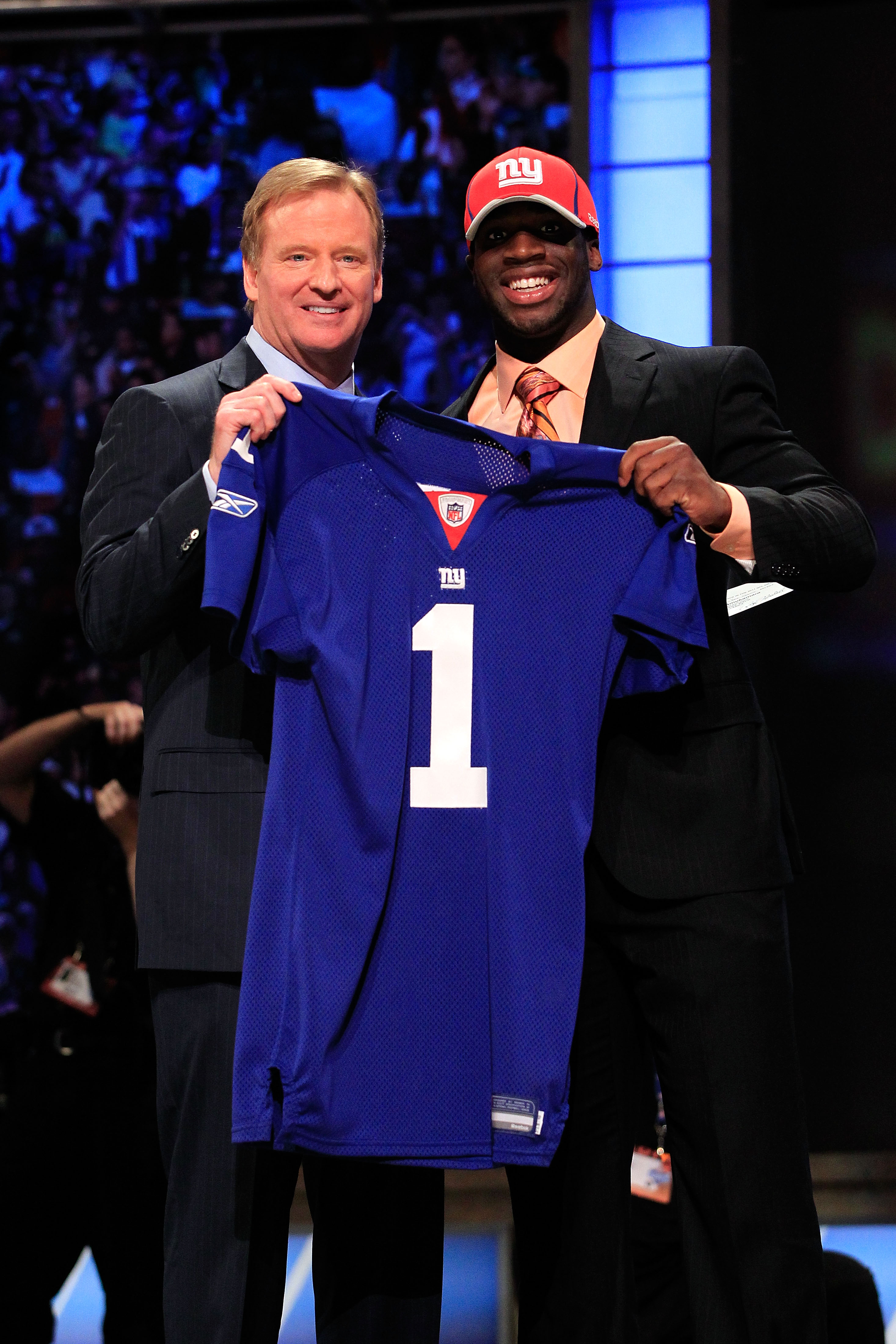 NEW YORK, NY - APRIL 28:  NFL Commissioner Roger Goodell (L) poses for a photo with Prince Amukamara, #19 overall pick by the New York Giants, on stage during the 2011 NFL Draft at Radio City Music Hall on April 28, 2011 in New York City.  (Photo by Chris