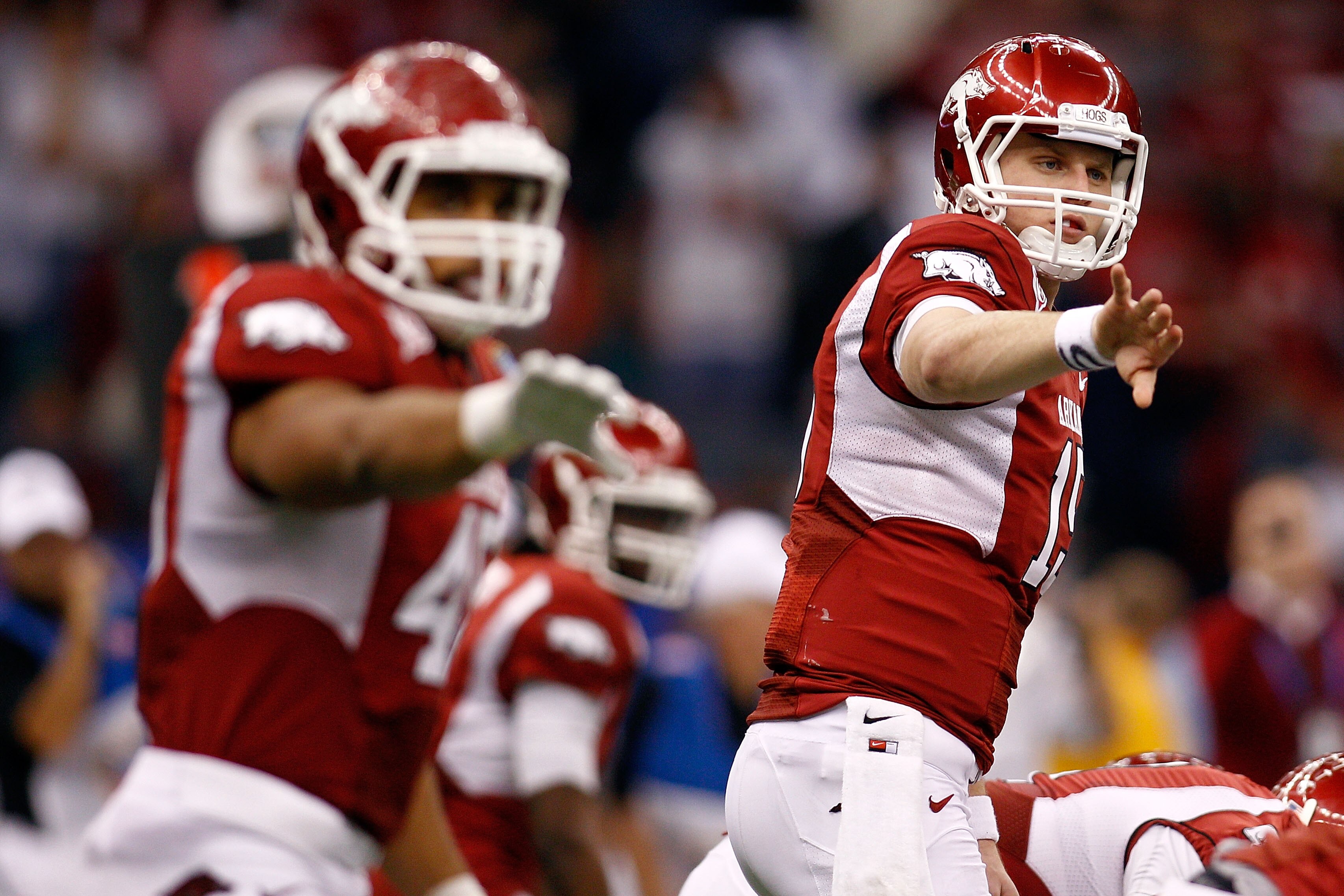 NEW ORLEANS, LA - JANUARY 04: (R) Ryan Mallett #15 of the Arkansas Razorbacks calls out alongside Jarius Wright #4 against the Ohio State Buckeyes during the Allstate Sugar Bowl at the Louisiana Superdome on January 4, 2011 in New Orleans, Louisiana. (P