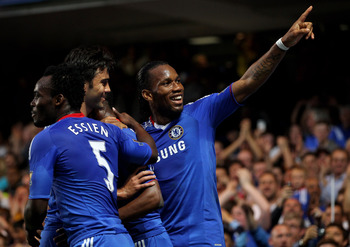 LONDON, ENGLAND - APRIL 20: Didier Drogba of Chelsea celebrates Salomon Kalou's goal during the Barclays Premier League match between Chelsea and Birmingham City at Stamford Bridge on April 20, 2011 in London, England.  (Photo by Julian Finney/Getty Image