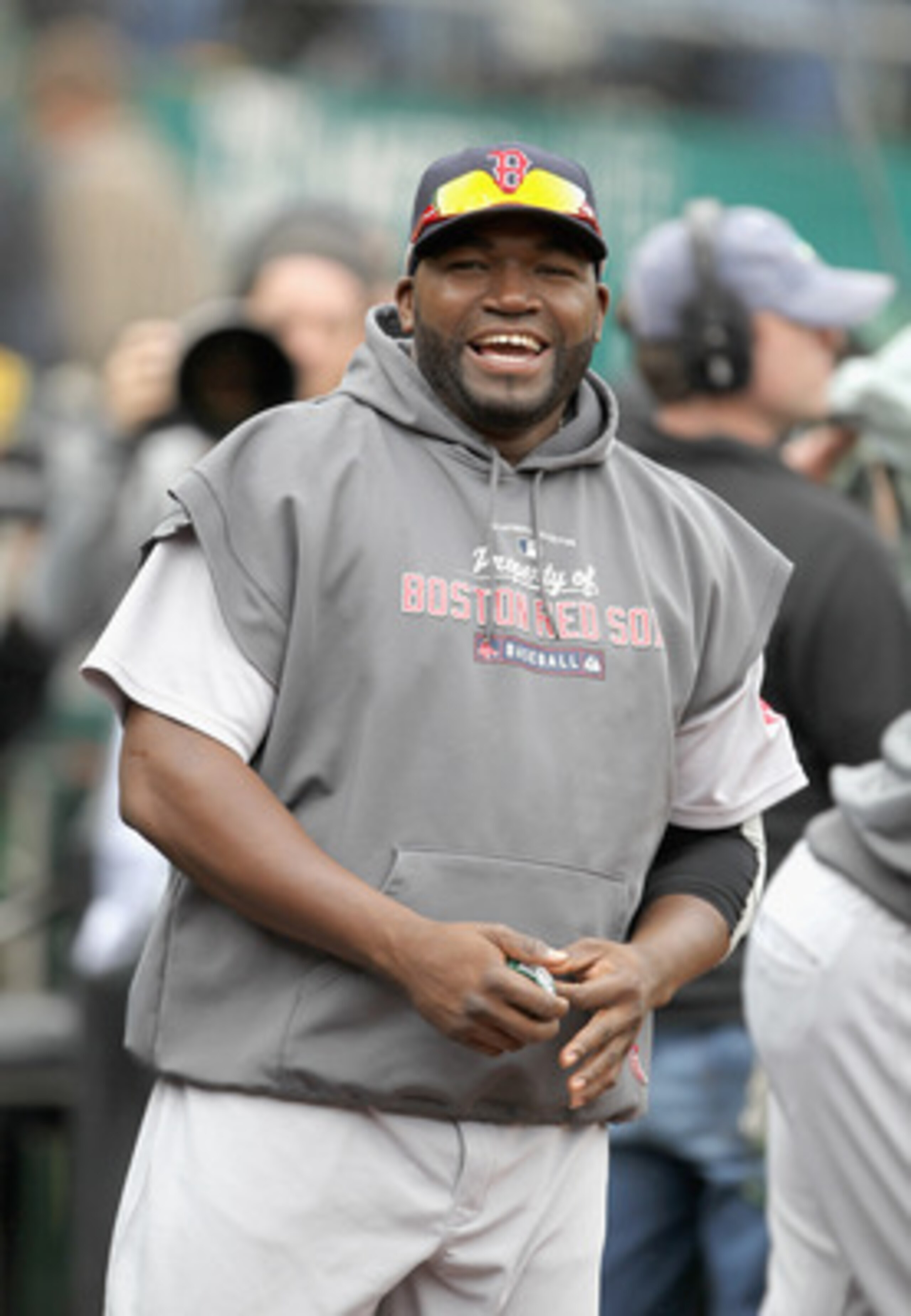 OAKLAND, CA - APRIL 20:  David Ortiz #34 of the Boston Red Sox smiles in the dugout before their game against the Oakland Athletics at Oakland-Alameda County Coliseum on April 20, 2011 in Oakland, California.  (Photo by Ezra Shaw/Getty Images)