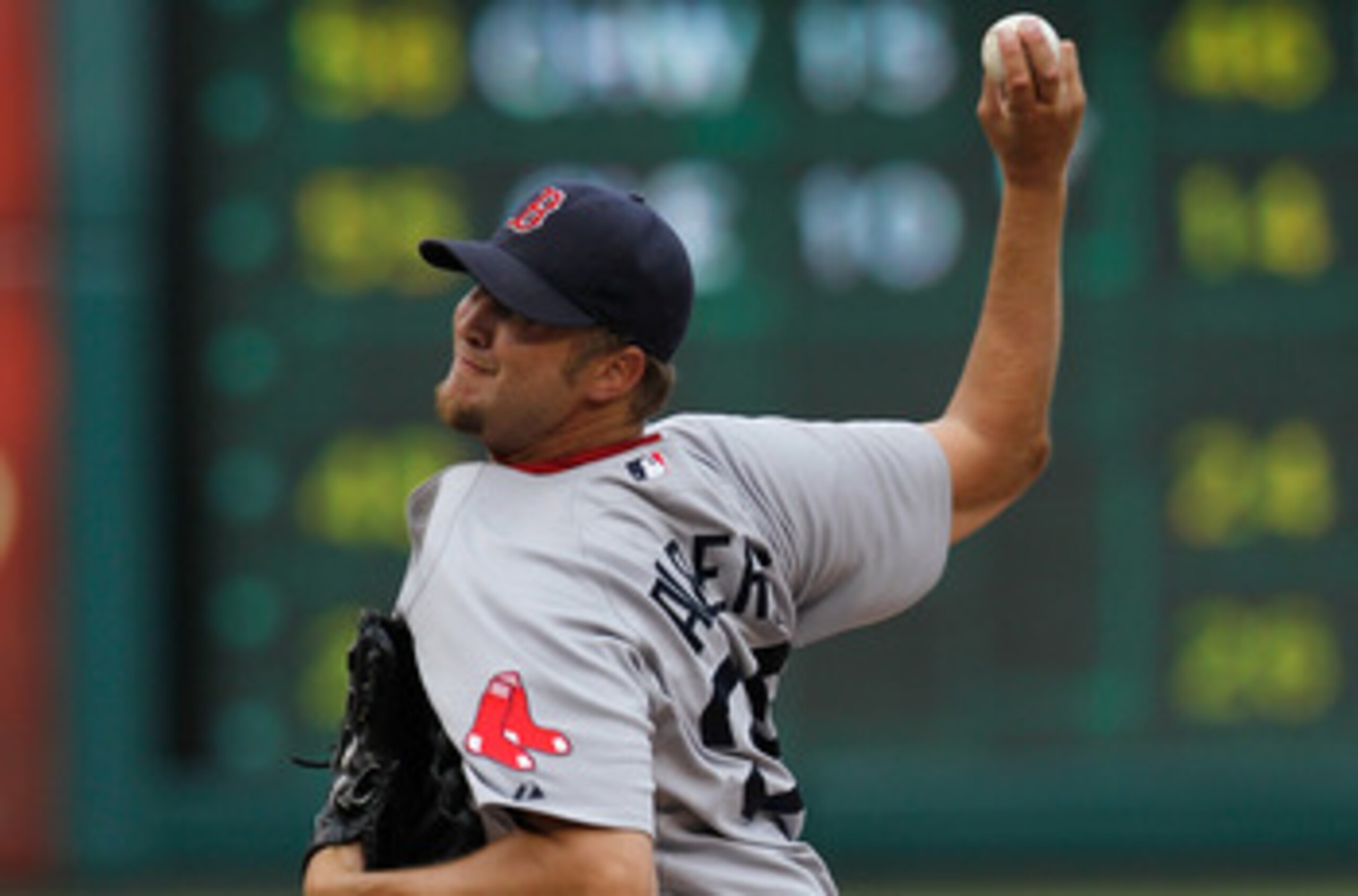 ARLINGTON, TX - APRIL 01:  Matt Albers #32 of the Boston Red Sox pitches against the Texas Rangers on Opening Day at Rangers Ballpark in Arlington on April 1, 2011 in Arlington, Texas.  (Photo by Tom Pennington/Getty Images)