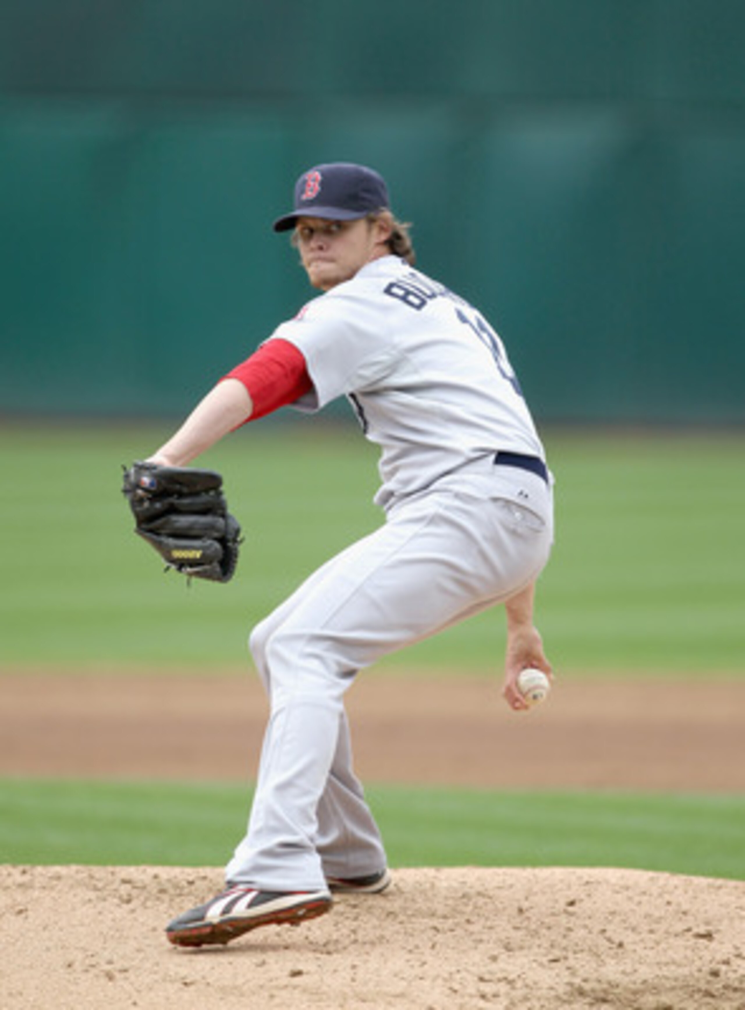 OAKLAND, CA - APRIL 20:  Clay Buchholz #11 of the Boston Red Sox in action against the Oakland Athletics at Oakland-Alameda County Coliseum on April 20, 2011 in Oakland, California.  (Photo by Ezra Shaw/Getty Images)
