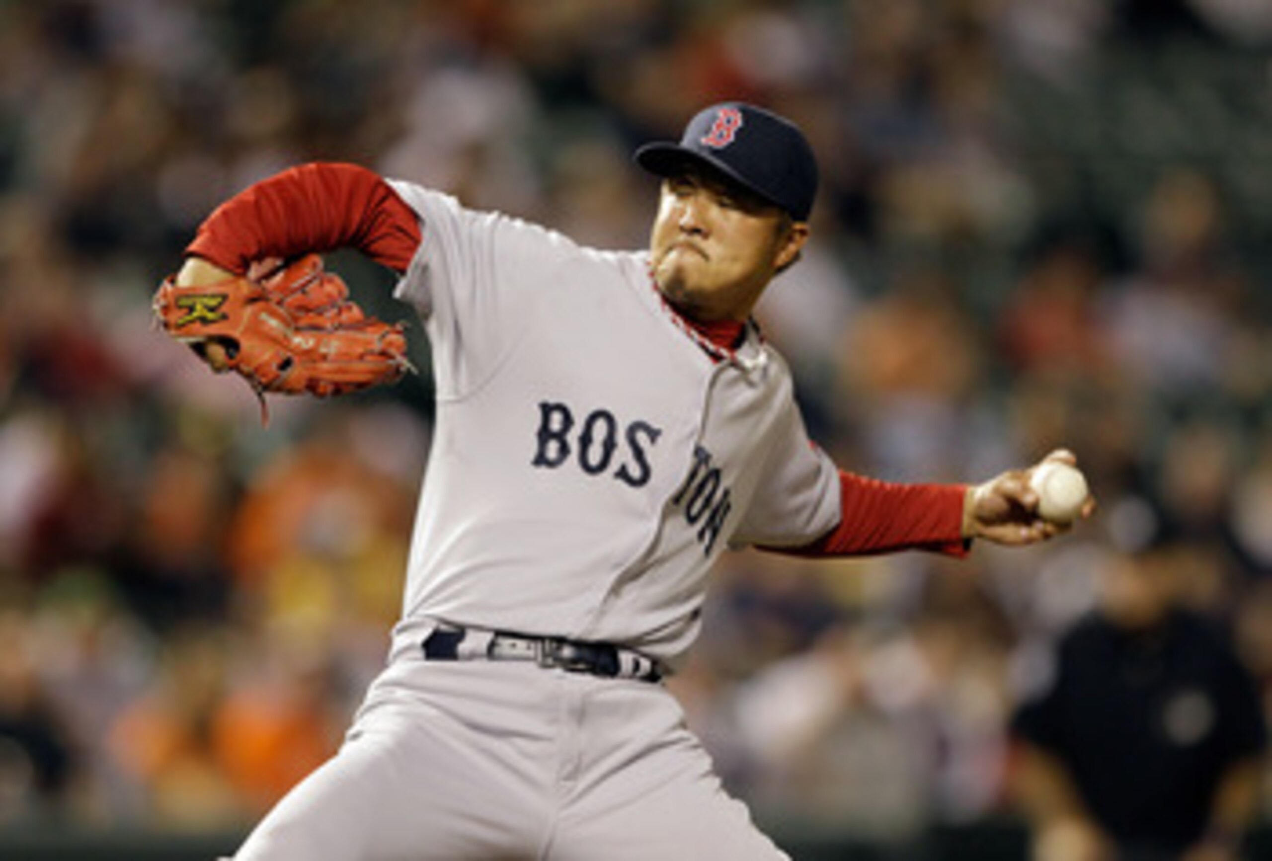 BALTIMORE, MD - APRIL 26: Pitcher Hideki Okajima #37 of the Boston Red Sox delivers to a Baltimore Orioles batter during the seventh inning at Oriole Park at Camden Yards on April 26, 2011 in Baltimore, Maryland.  (Photo by Rob Carr/Getty Images)