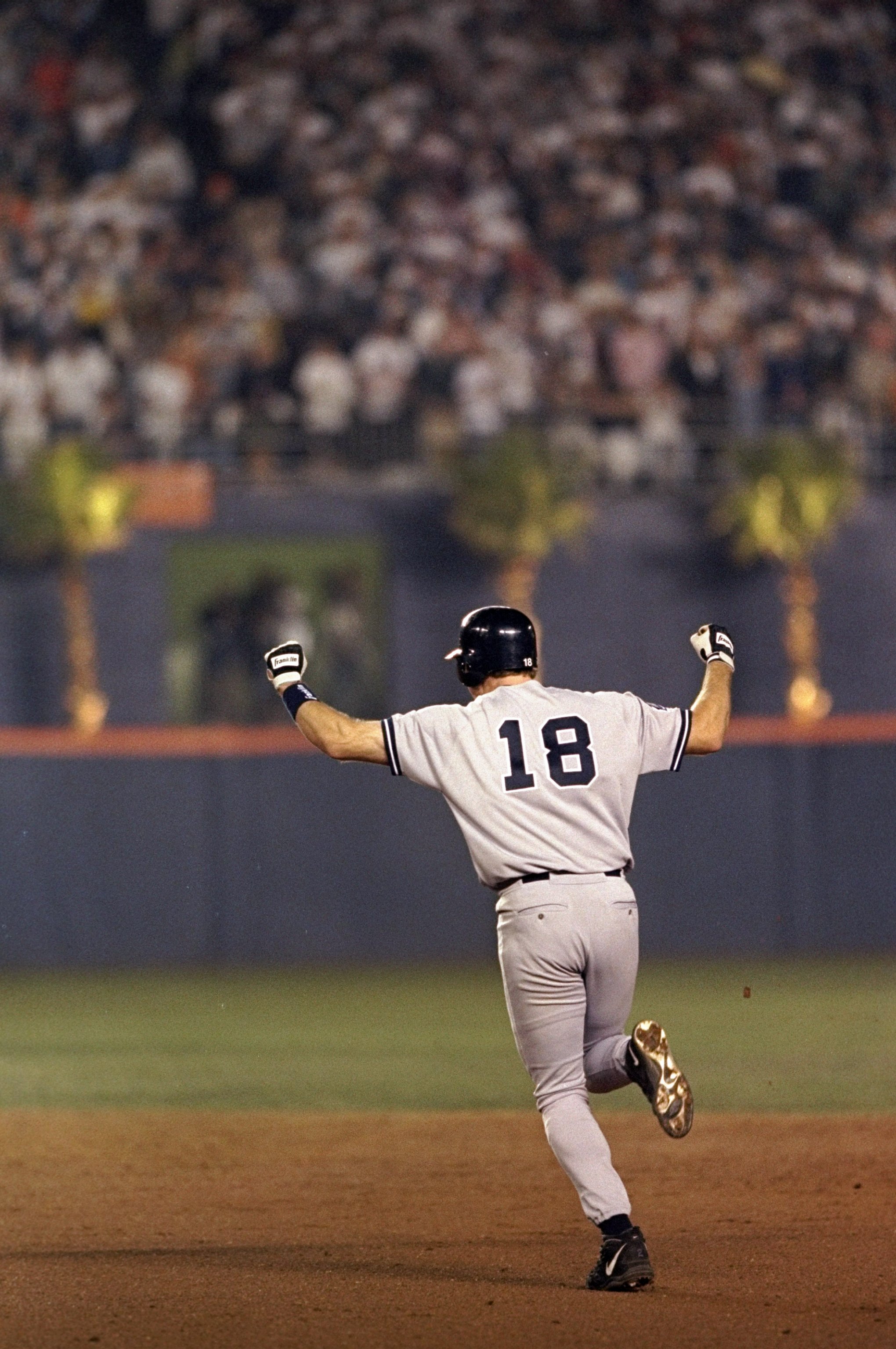 20 Oct 1998:  Infielder Scott Brosius #18 of the New York Yankees celebrates hitting the winning home run during the 1998 World Series Game 3 against the San Diego Padres at the Qualcomm Stadium in San Diego, California. The Yankees defeated the Padres 5-