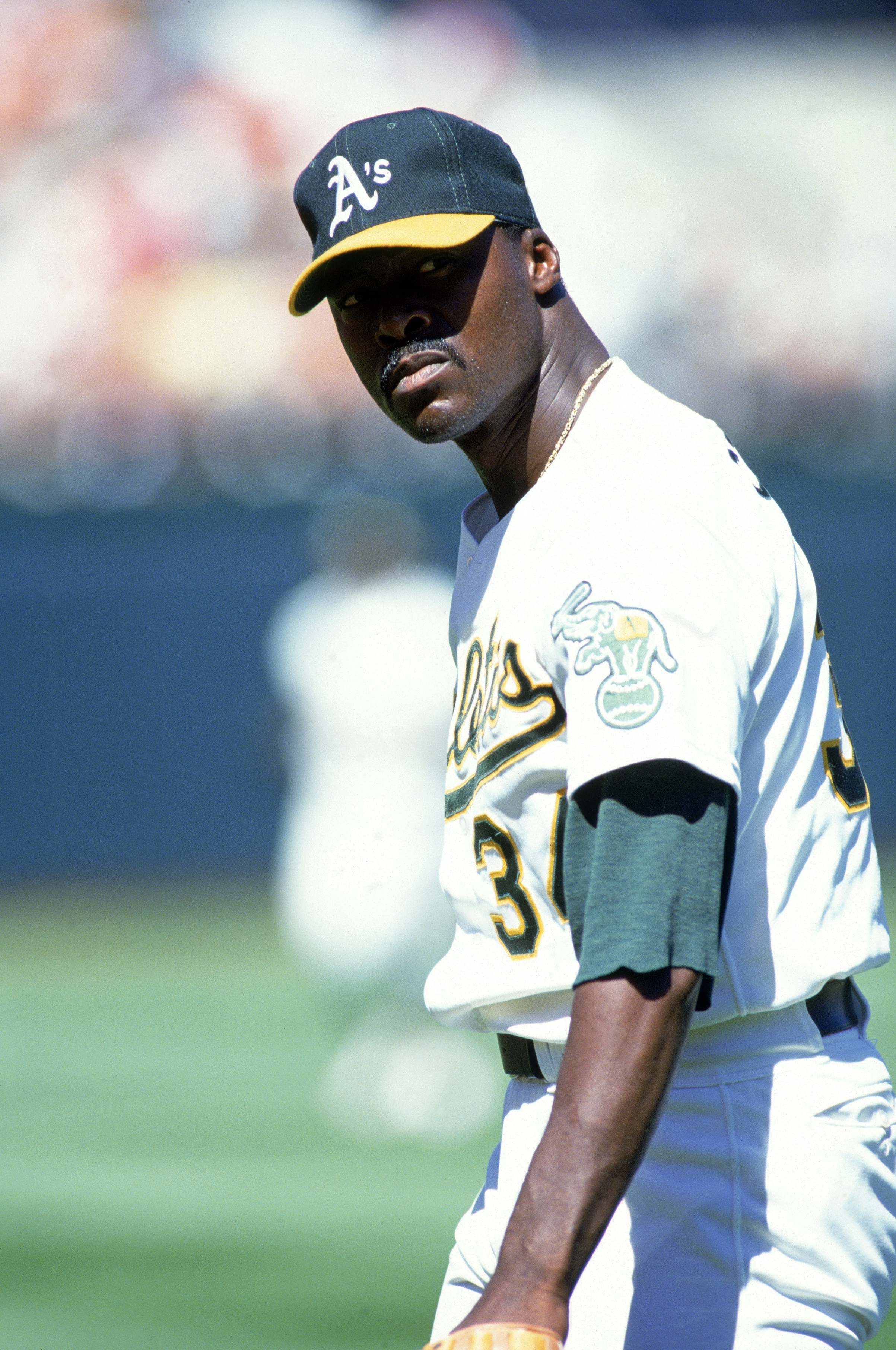 OAKLAND, CA - 1990:  Pitcher Dave Stewart #34 of the Oakland Athletics looks on from the mound during a game of the 1990 American League Season at the Oakland-Alameda County Coliseum in Oakland, California.   (Photo by Otto Greule Jr/Getty Images)