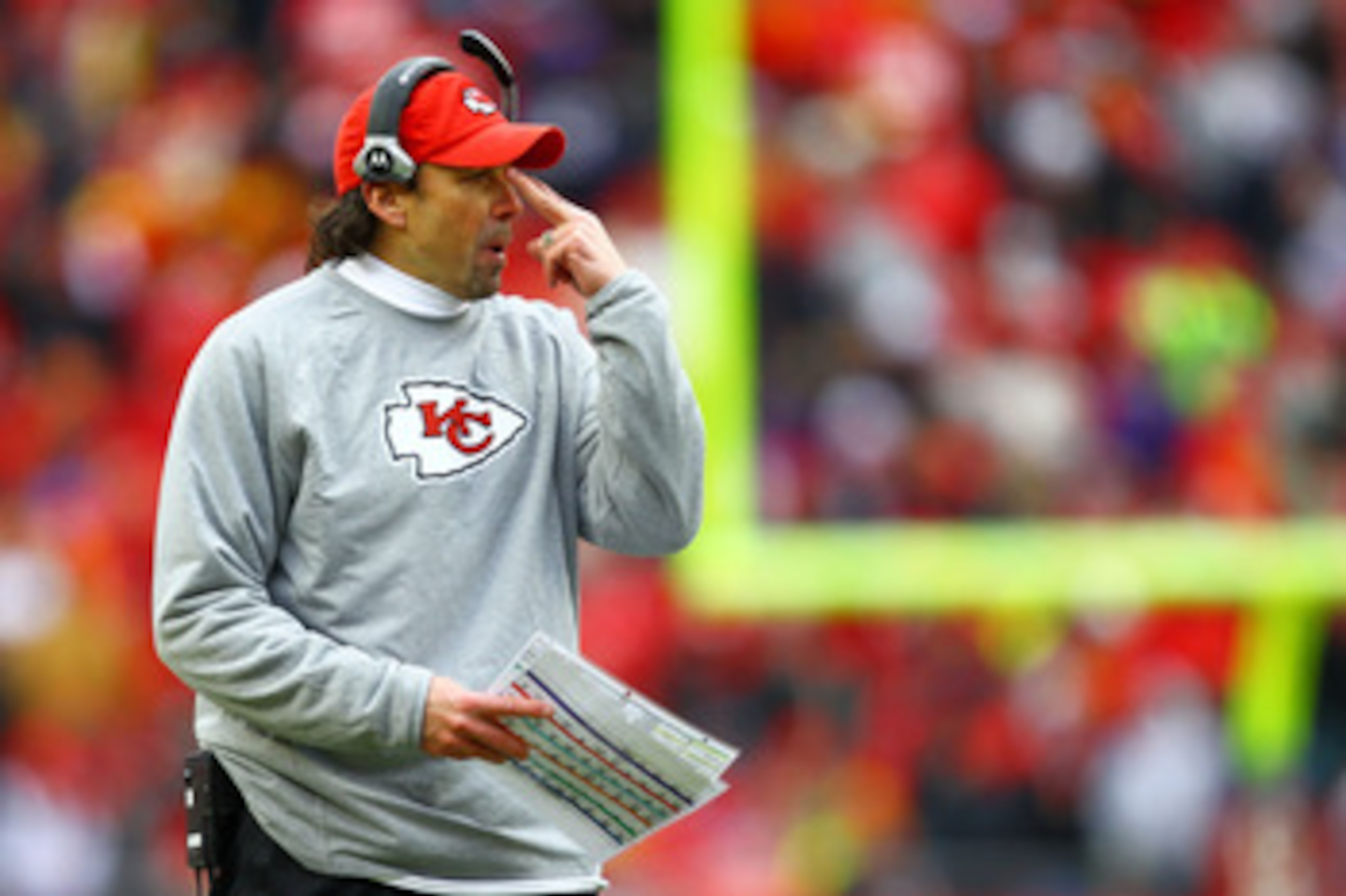 KANSAS CITY, MO - JANUARY 09:  Head coach Todd Haley of the Kansas City Chiefs looks on during the 2011 AFC wild card playoff game against the Baltimore Ravens at Arrowhead Stadium on January 9, 2011 in Kansas City, Missouri.  (Photo by Dilip Vishwanat/Ge