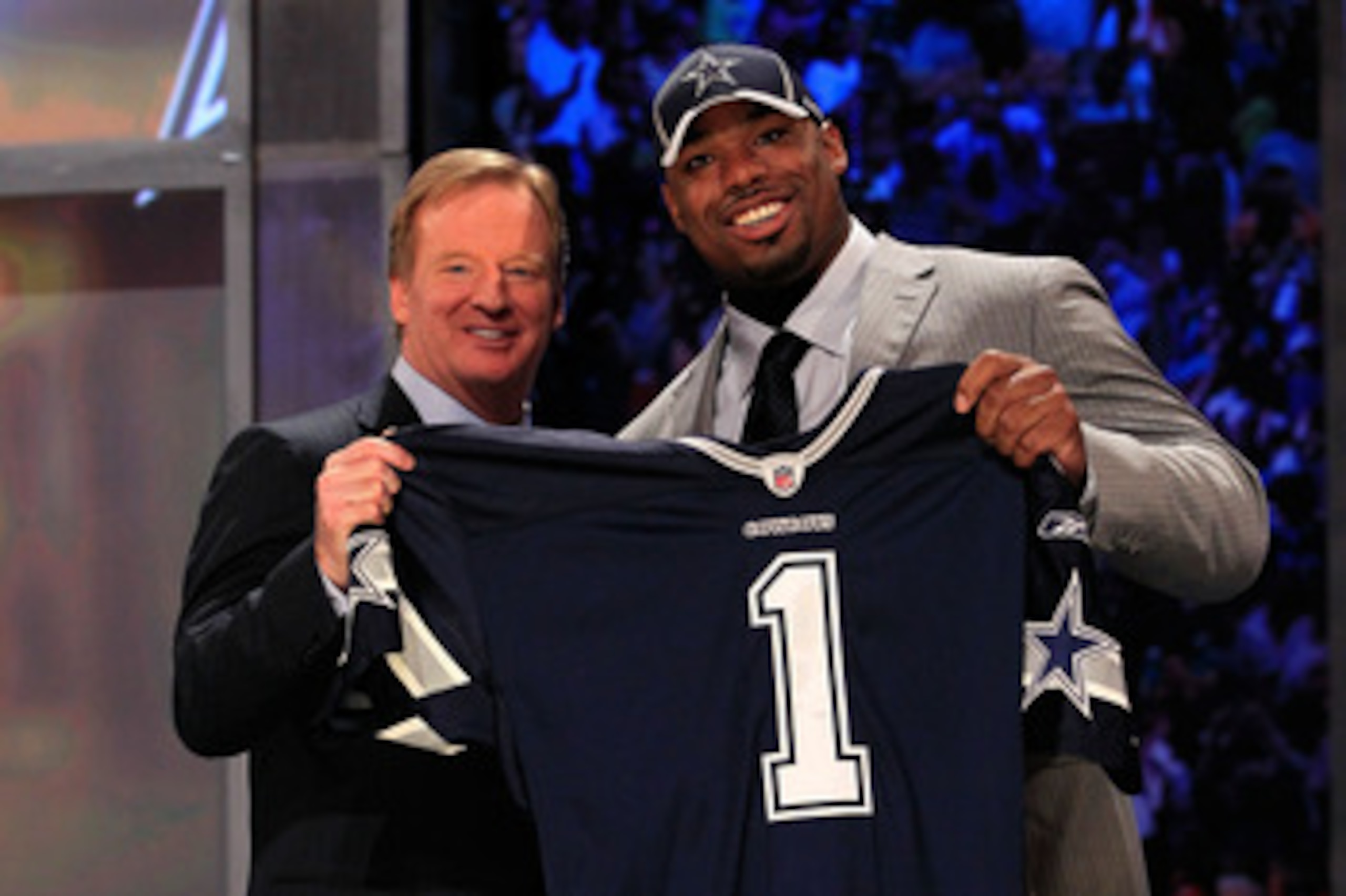 NEW YORK, NY - APRIL 28:  NFL Commissioner Roger Goodell (L) poses for a photo with Tyron Smith, #9 overall pick by the Dallas Cowboys, on stage during the 2011 NFL Draft at Radio City Music Hall on April 28, 2011 in New York City.  (Photo by Chris Trotma