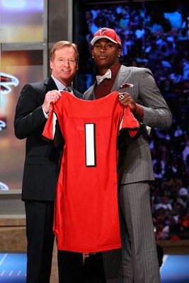 NEW YORK, NY - APRIL 28:  NFL Commissioner Roger Goodell (L) poses for a photo with Julio Jones, #6 overall pick by the Atlanta Falcons, holds up a jersey on stage during the 2011 NFL Draft at Radio City Music Hall on April 28, 2011 in New York City.  (Ph