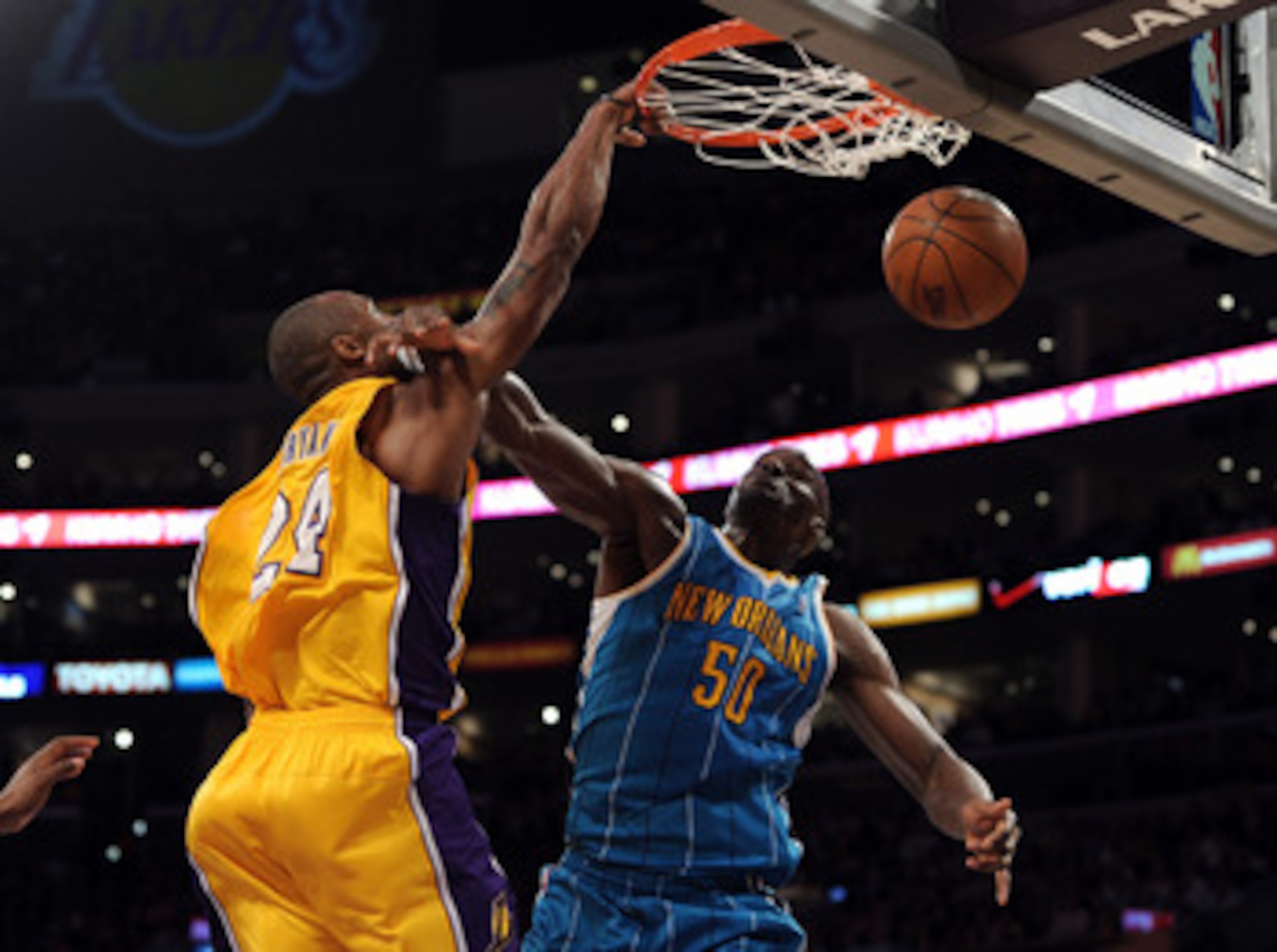 LOS ANGELES, CA - APRIL 26: Kobe Bryant #24 of the Los Angeles Lakers dunks the ball over Emeka Okafor #50 of the New Orleans Hornets in the second quarter in Game Five of the Western Conference Quarterfinals in the 2011 NBA Playoffs on April 26, 2011 at LOS ANGELES, CA - APRIL 26: Kobe Bryant #24 of the Los Angeles Lakers dunks the ball over Emeka Okafor #50 of the New Orleans Hornets in the second quarter in Game Five of the Western Conference Quarterfinals in the 2011 NBA Playoffs on April 26, 2011 at