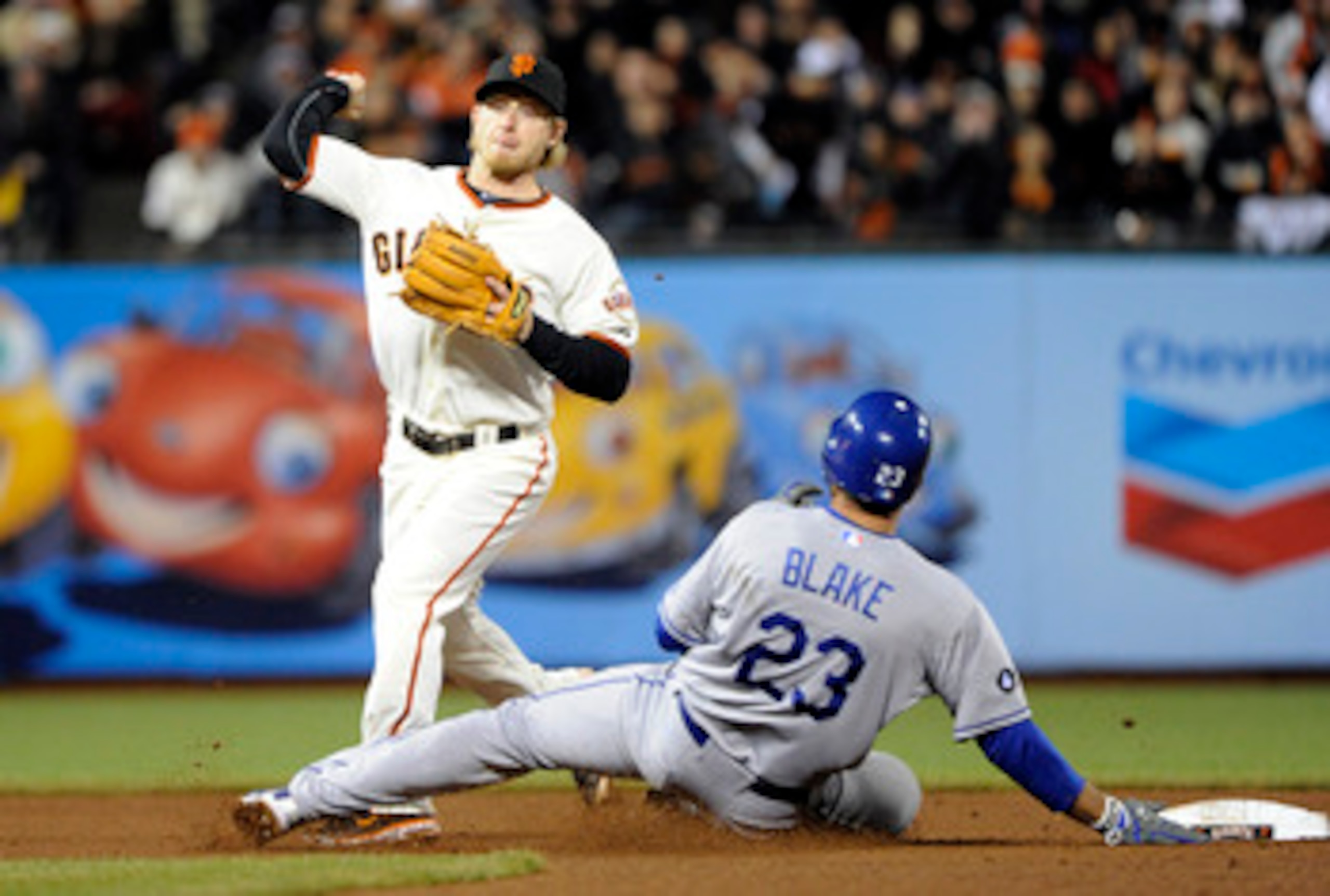 SAN FRANCISCO, CA - APRIL 13: Casey Blake #23 of the Los Angeles Dodgers slides into Mike Fontenot #14 of the San Francisco Giants, breaking up a double play during a MLB baseball game at AT&T Park April 13, 2011 in San Francisco, California. (Photo by T SAN FRANCISCO, CA - APRIL 13: Casey Blake #23 of the Los Angeles Dodgers slides into Mike Fontenot #14 of the San Francisco Giants, breaking up a double play during a MLB baseball game at AT&T Park April 13, 2011 in San Francisco, California. (Photo by T
