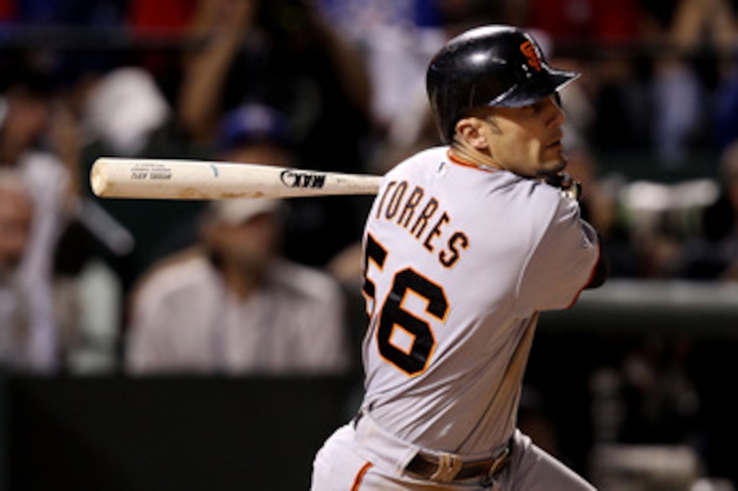 ARLINGTON, TX - OCTOBER 31: Andres Torres #56 of the San Francisco Giants hits a RBI double in the top of the seventh inning the Texas Rangers in Game Four of the 2010 MLB World Series at Rangers Ballpark in Arlington on October 31, 2010 in Arlington, Te ARLINGTON, TX - OCTOBER 31: Andres Torres #56 of the San Francisco Giants hits a RBI double in the top of the seventh inning the Texas Rangers in Game Four of the 2010 MLB World Series at Rangers Ballpark in Arlington on October 31, 2010 in Arlington, Te
