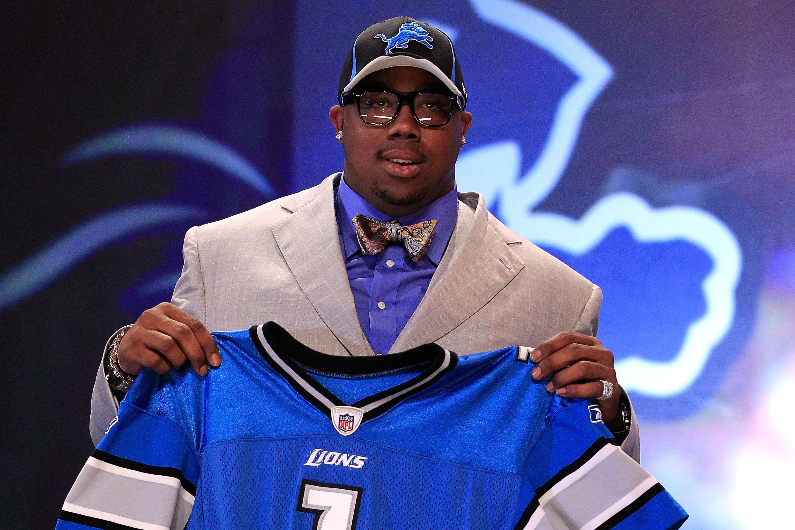 Tennessee Titans player Jurrell Casey enters the main stage to announce the  Titans selection of North Carolina-Charlotte guard Nate Davis during the  third round of the NFL football draft, Friday, April 26