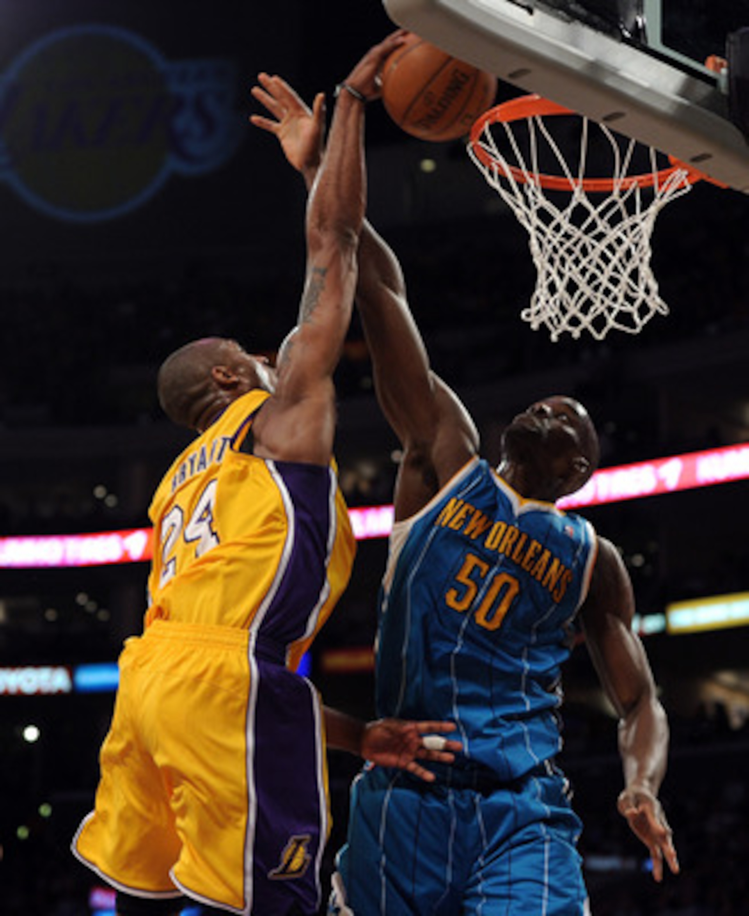 LOS ANGELES, CA - APRIL 26: Kobe Bryant #24 of the Los Angeles Lakers dunks the ball over Emeka Okafor #50 of the New Orleans Hornets in the second quarter in Game Five of the Western Conference Quarterfinals in the 2011 NBA Playoffs on April 26, 2011 at LOS ANGELES, CA - APRIL 26: Kobe Bryant #24 of the Los Angeles Lakers dunks the ball over Emeka Okafor #50 of the New Orleans Hornets in the second quarter in Game Five of the Western Conference Quarterfinals in the 2011 NBA Playoffs on April 26, 2011 at