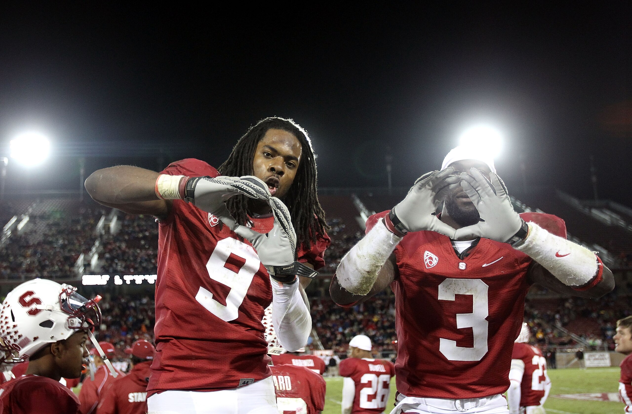 PALO ALTO, CA - NOVEMBER 27:  Michael Thomas #3 and Richard Sherman #9 of the Stanford Cardinal celebrate after they beat the Oregon State Beavers at Stanford Stadium on November 27, 2010 in Palo Alto, California.  (Photo by Ezra Shaw/Getty Images)
