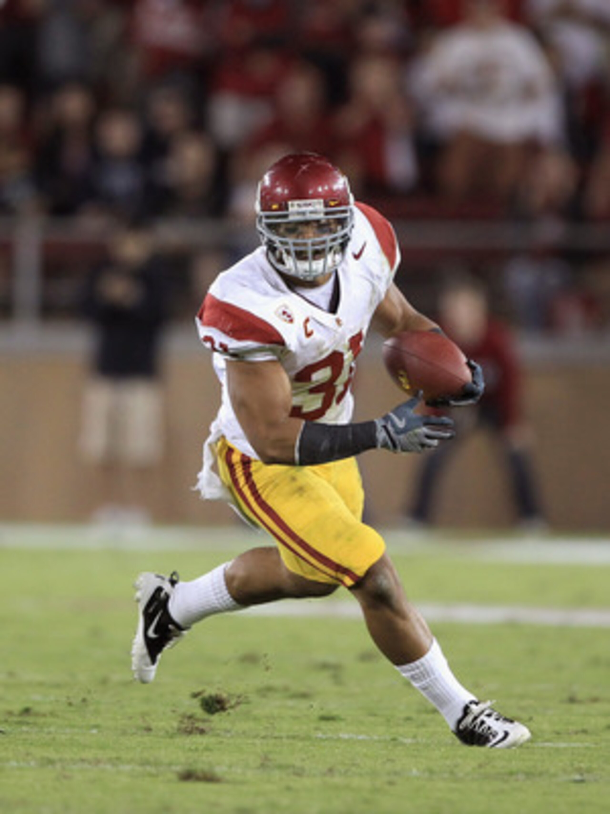 PALO ALTO, CA - OCTOBER 09:  Stanley Havili #31 of the USC Trojans runs with the ball during their game against the Stanford Cardinal at Stanford Stadium on October 9, 2010 in Palo Alto, California.  (Photo by Ezra Shaw/Getty Images)
