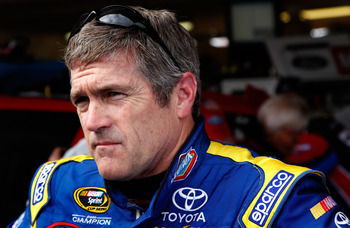 AVONDALE, AZ - FEBRUARY 25:  Bobby Labonte, driver of the #47 Clorox Toyota, stands in the garage area during practice for the Subway Fresh Fit 500 at Phoenix International Raceway on February 25, 2011 in Avondale, Arizona.  (Photo by Tom Pennington/Getty
