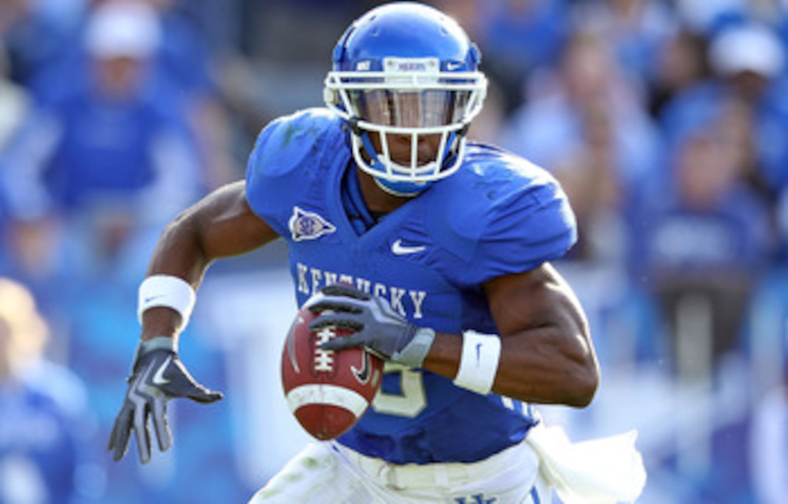 LEXINGTON, KY - NOVEMBER 13: Randall Cobb #18 of the Kentucky Wildcats runs with the ball during the game against the Vanderbilt Commodores at Commonwealth Stadium on November 13, 2010 in Lexington, Kentucky. Kentucky won 38-20. (Photo by Andy Lyons/Get LEXINGTON, KY - NOVEMBER 13: Randall Cobb #18 of the Kentucky Wildcats runs with the ball during the game against the Vanderbilt Commodores at Commonwealth Stadium on November 13, 2010 in Lexington, Kentucky. Kentucky won 38-20. (Photo by Andy Lyons/Get