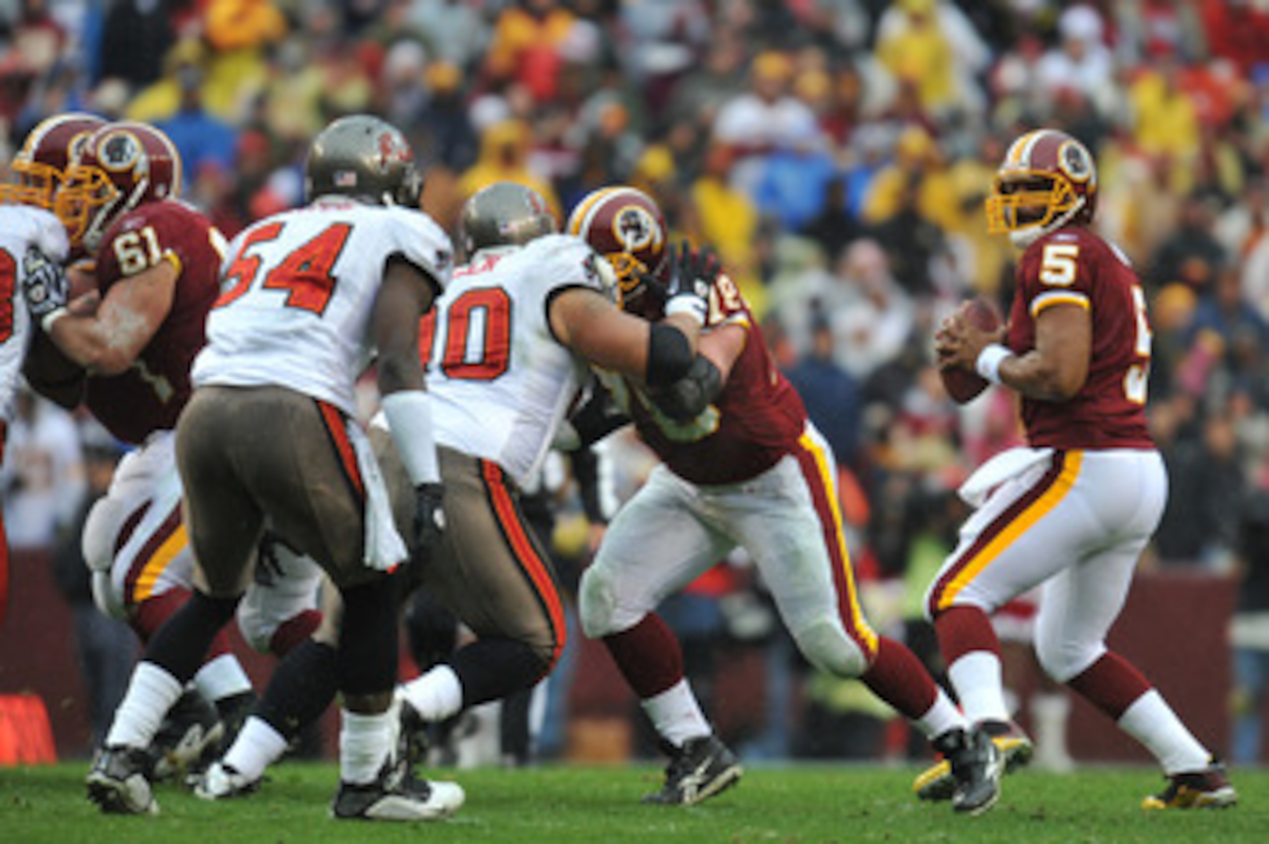 LANDOVER, MD - DECEMBER 12:  Donovan McNabb #5 of the Washington Redskins passes against the Tampa Bay Buccaneers  at FedExField on December 12, 2010 in Landover, Maryland. The Buccaneers defeated the Redskins 17-16. (Photo by Larry French/Getty Images)
