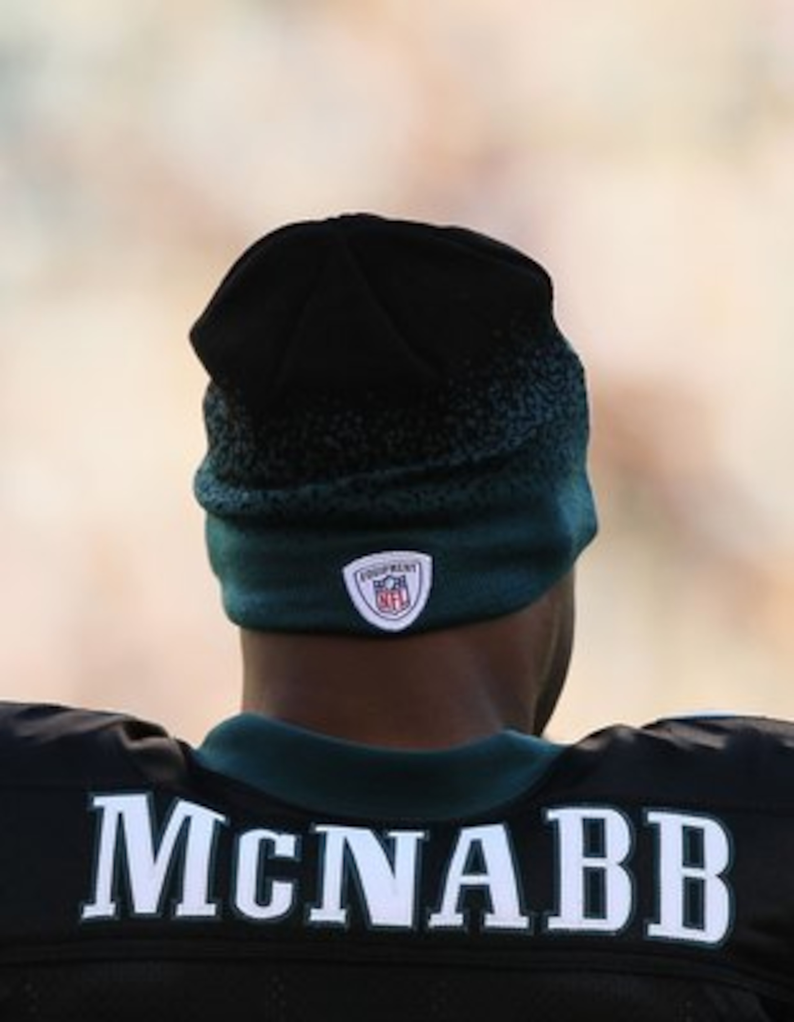PHILADELPHIA - NOVEMBER 29:  Donovan McNabb #5 of the Philadelphia Eagles watches the game from the sidelines against the Washington Redskins during their game at Lincoln Financial Field on November 29, 2009 in Philadelphia, Pennsylvania.  (Photo by Al Be
