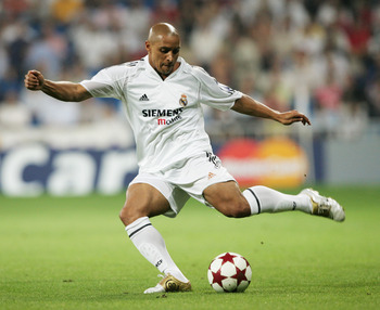 MADRID, SPAIN - SEPTEMBER 28:  Roberto Carlos of Real Madrid in action during the UEFA Champions League Group B match between Real Madrid and Roma at the Santiago Bernabeu Stadium on September 28, 2004 in Madrid, Spain.  (Photo by Shaun Botterill/Getty Im