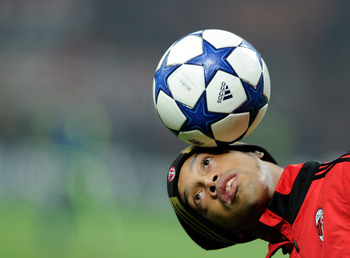 MILAN, ITALY - DECEMBER 08:  Ronaldinho of AC Milan before the UEFA Champions League Group G match between AC Milan and AFC Ajax at Stadio Giuseppe Meazza on December 8, 2010 in Milan, Italy.  (Photo by Claudio Villa/Getty Images)