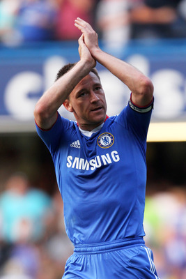 LONDON, ENGLAND - APRIL 30:  John Terry of Chelsea celebrate following their team's 2-1 victory during the Barclays Premier League match between Chelsea and Tottenham Hotspur at Stamford Bridge on April 30, 2011 in London, England.  (Photo by Scott Heavey